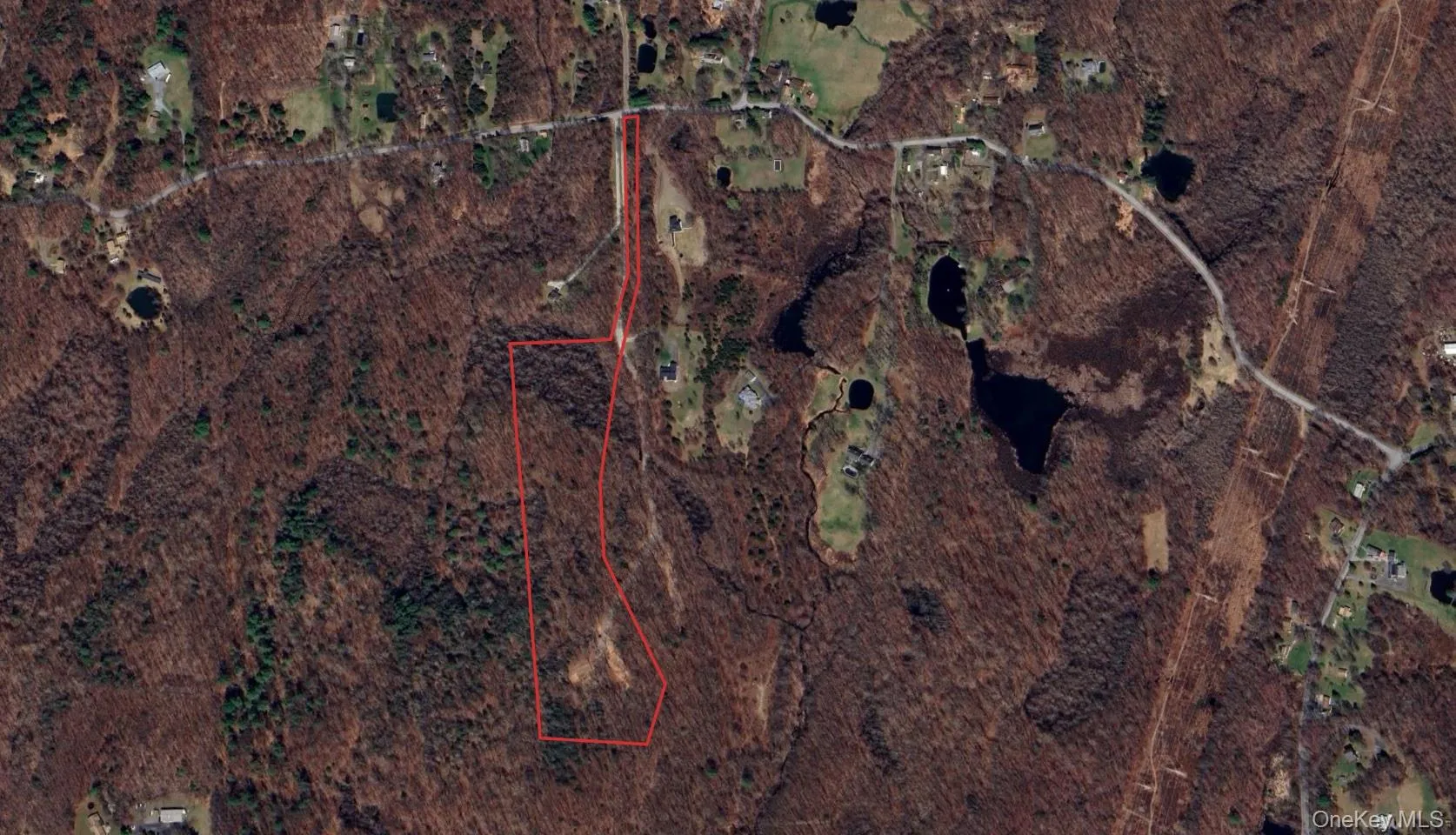 Aerial view of property's location with property boundaries highlighted Aerial view of property's location with property boundaries highlighted