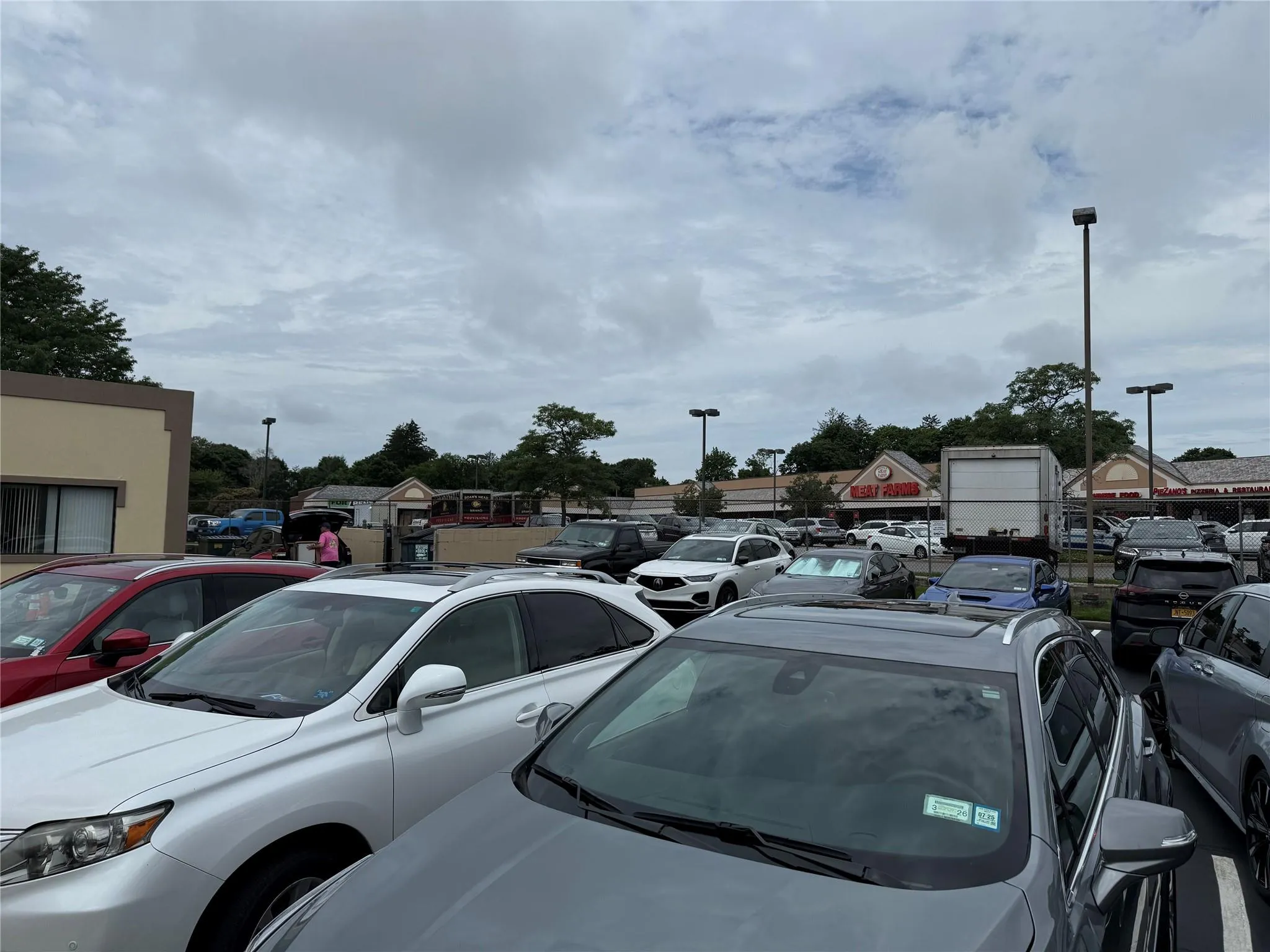 View of uncovered parking lot View of uncovered parking lot