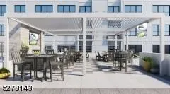 View of patio featuring outdoor dining space View of patio featuring outdoor dining space