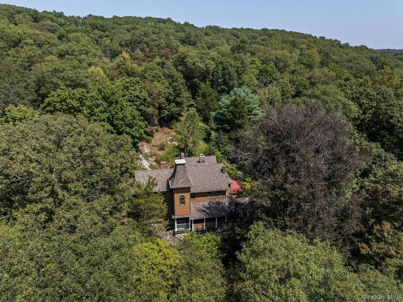 View from above of property featuring a forest View from above of property featuring a forest