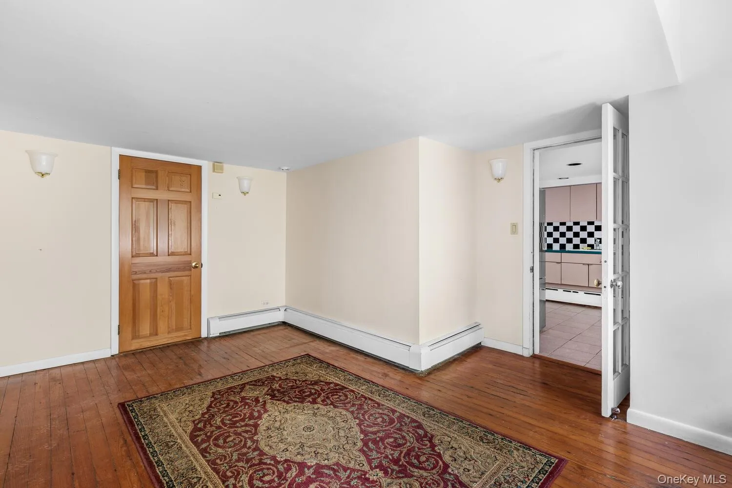LL spare room featuring dark wood flooring LL spare room featuring dark wood flooring