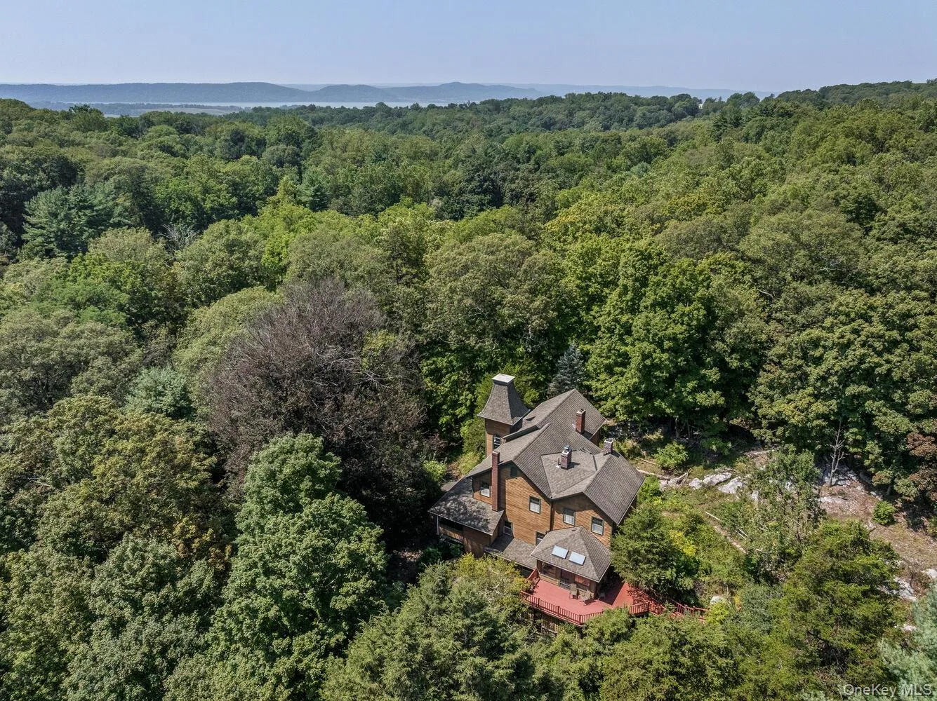 View from above of property featuring a forest View from above of property featuring a forest