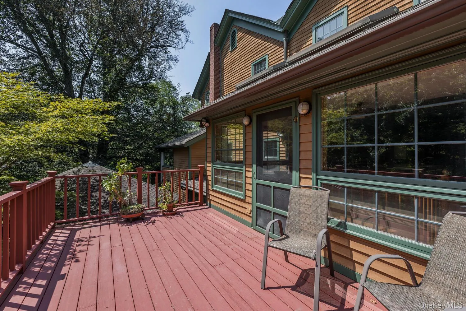 View of wooden deck, with door to the kitchen View of wooden deck, with door to the kitchen