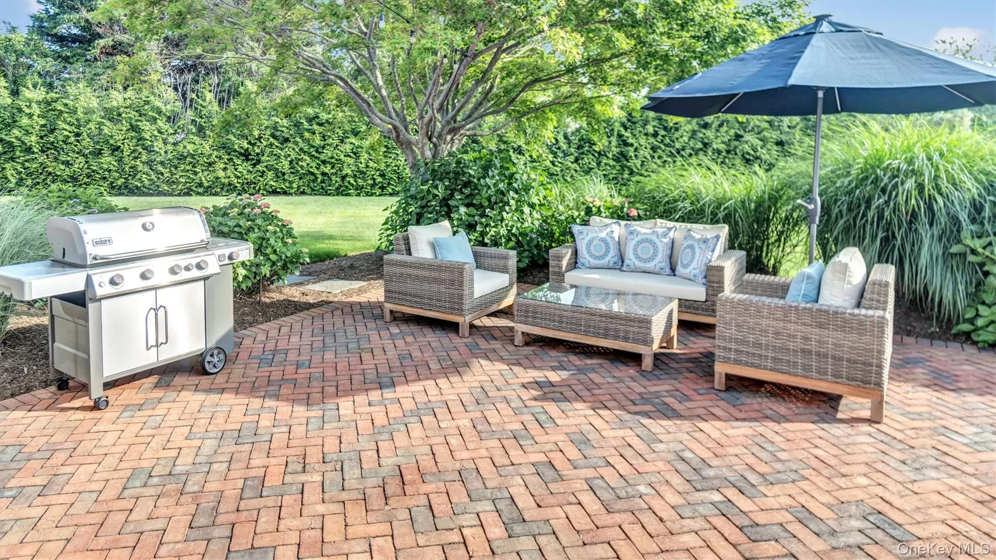 View of patio with a grill and outdoor lounge area View of patio with a grill and outdoor lounge area