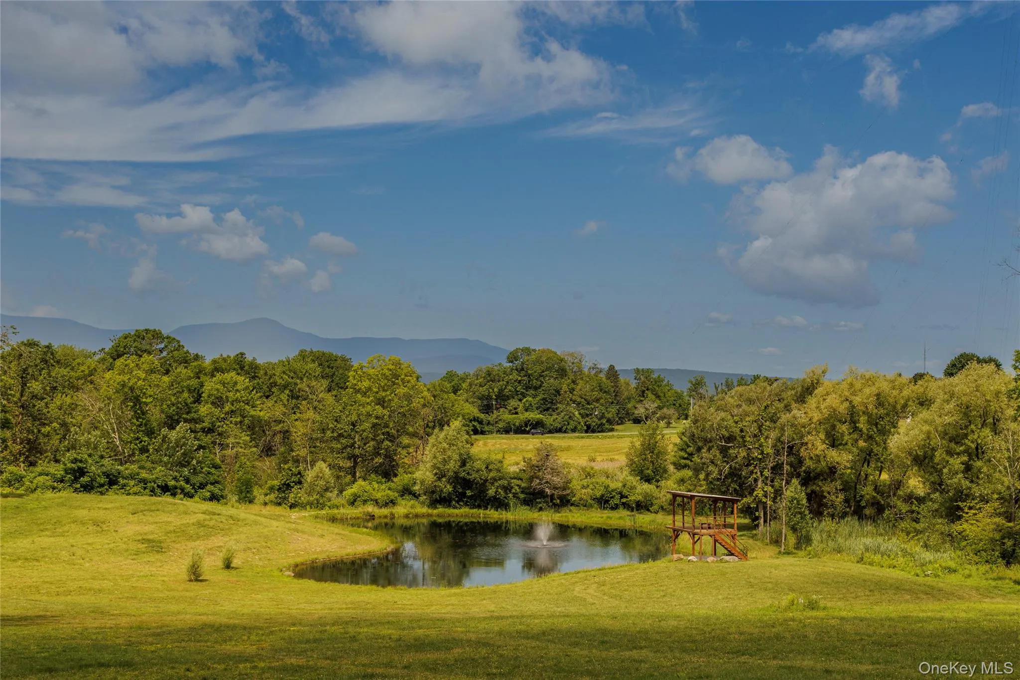 Water view with a mountainous background Water view with a mountainous background