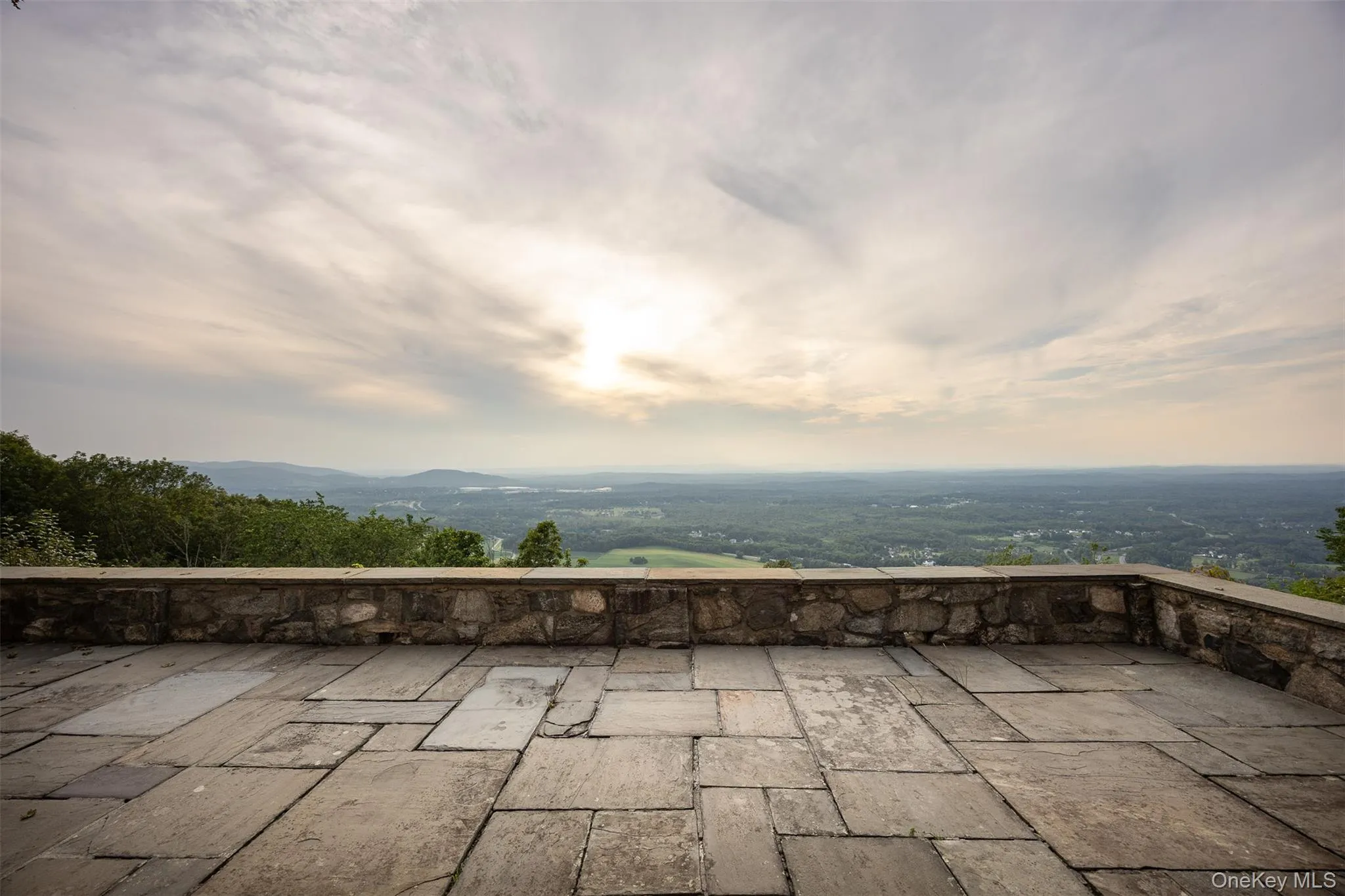 View of patio / terrace featuring a mountain view View of patio / terrace featuring a mountain view