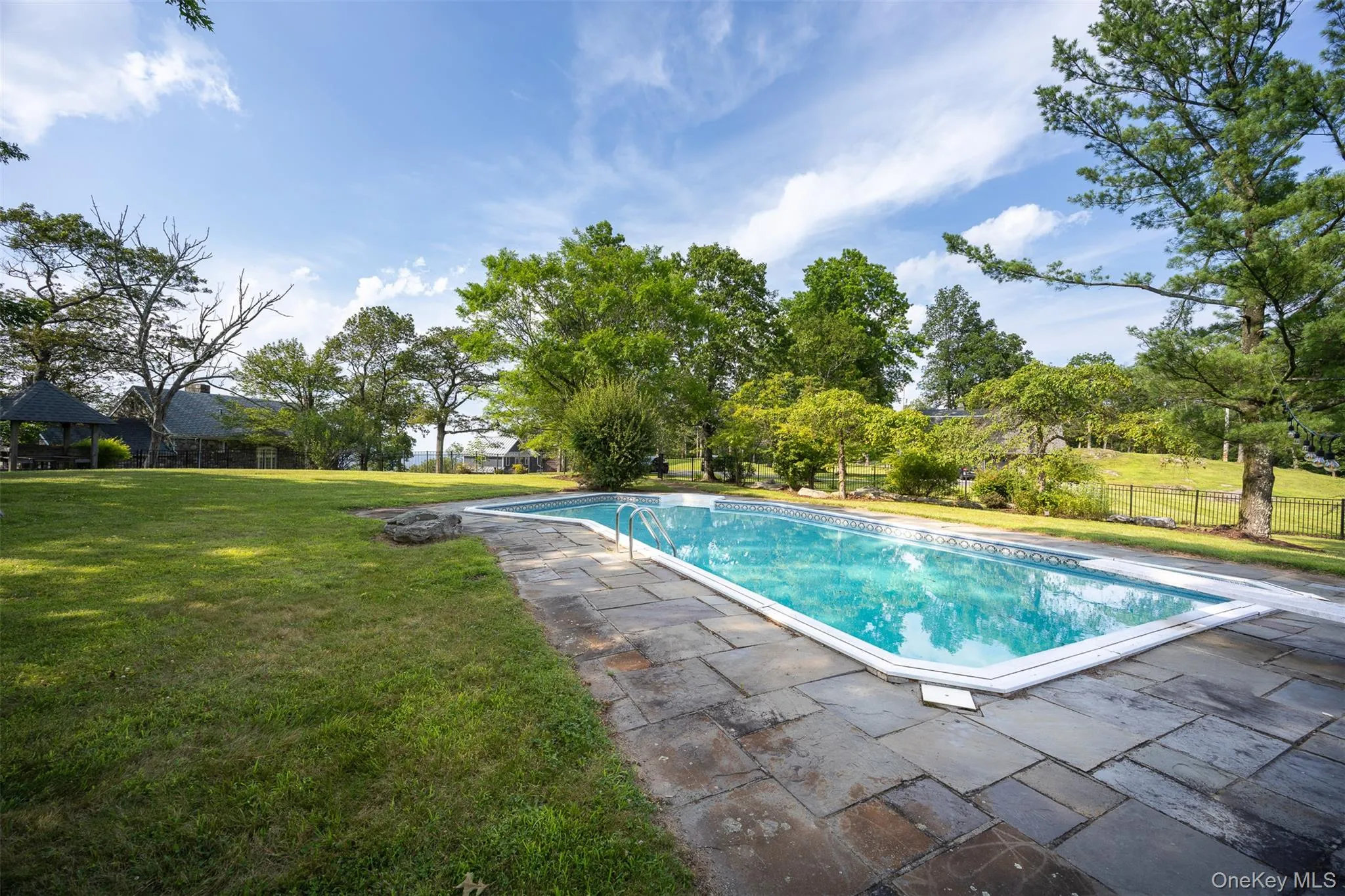 View of swimming pool with a patio area View of swimming pool with a patio area