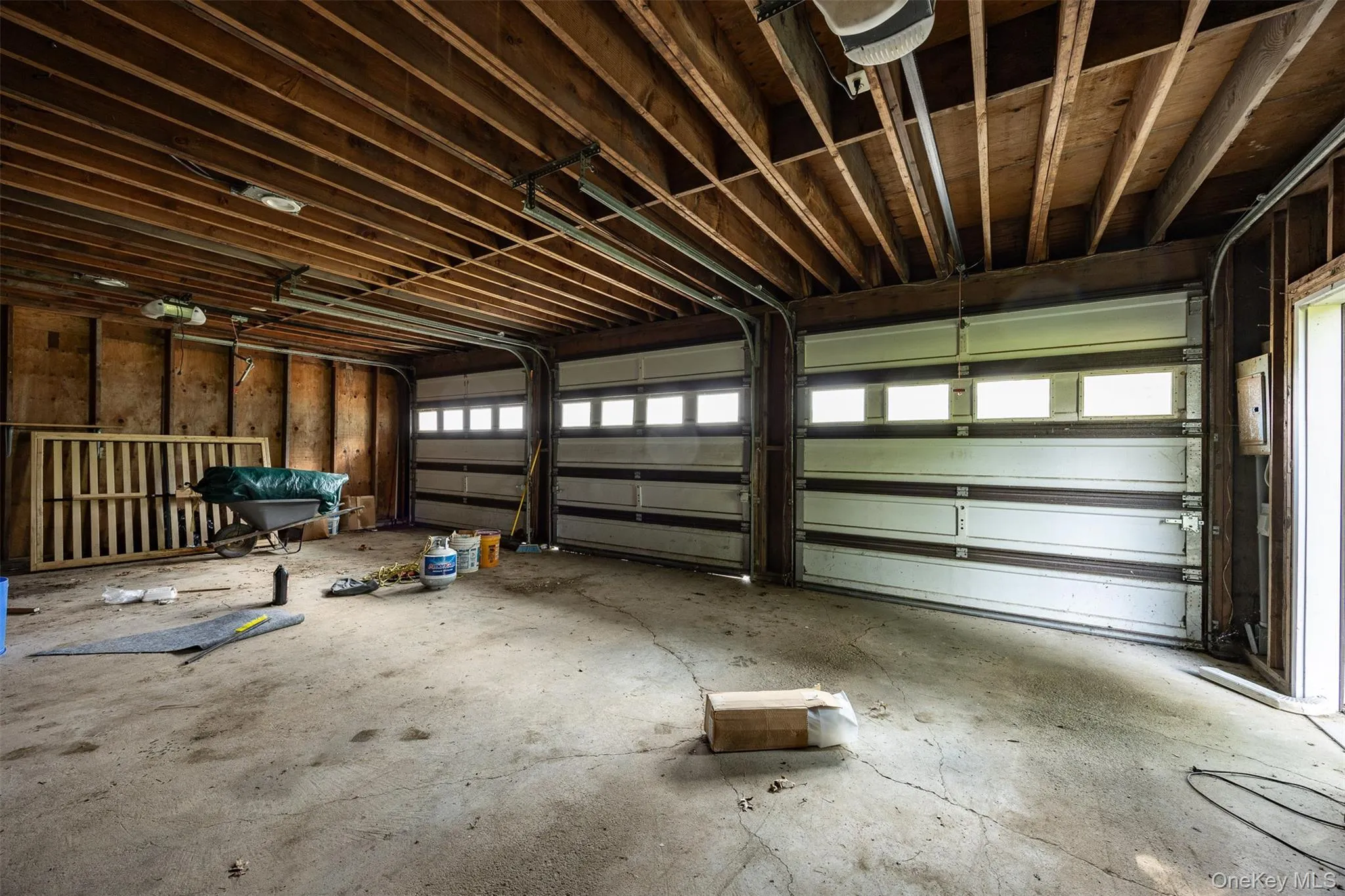 Garage with a garage door opener Garage with a garage door opener