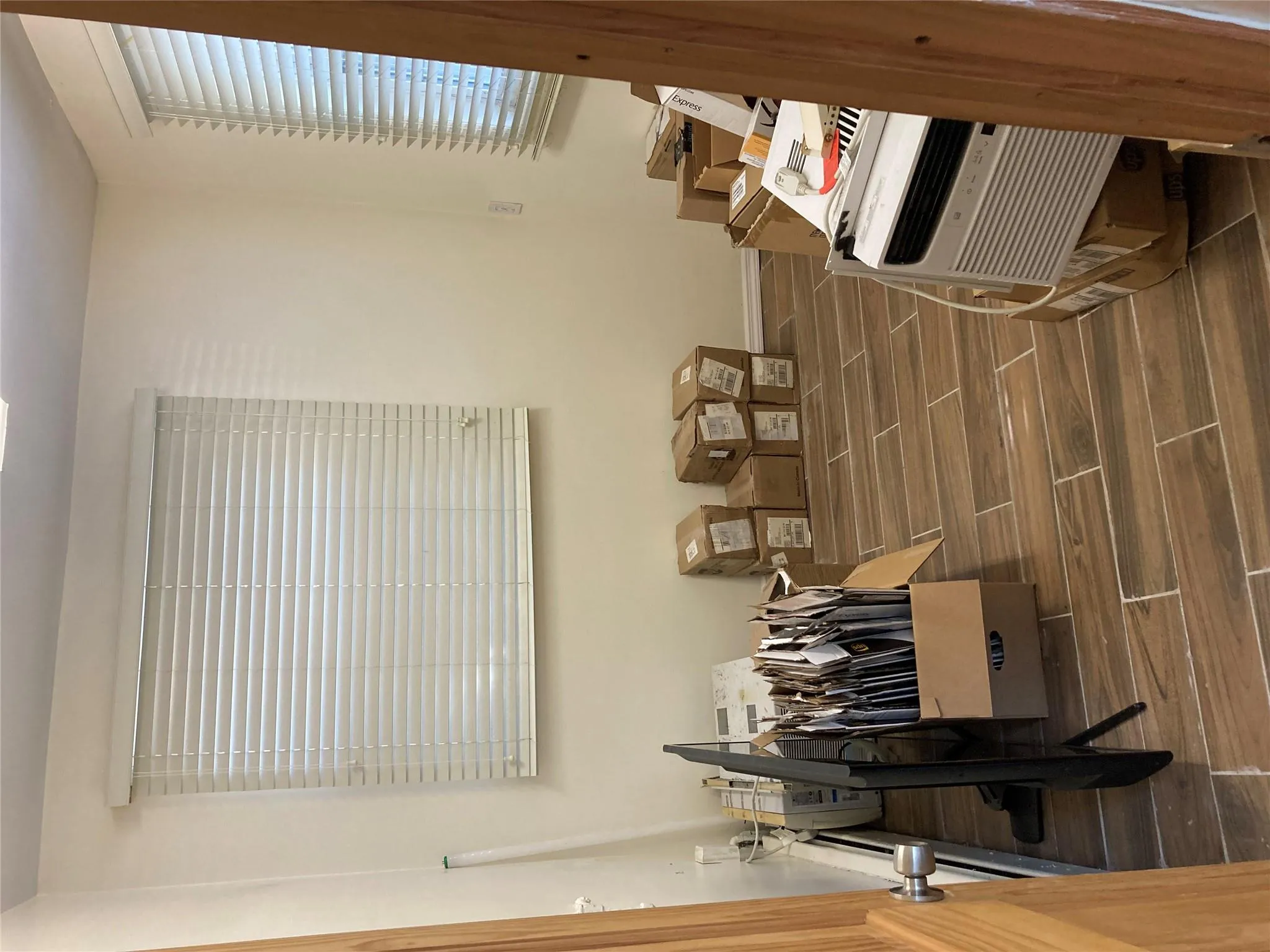 Miscellaneous room with wood tiled floors and baseboards Miscellaneous room with wood tiled floors and baseboards