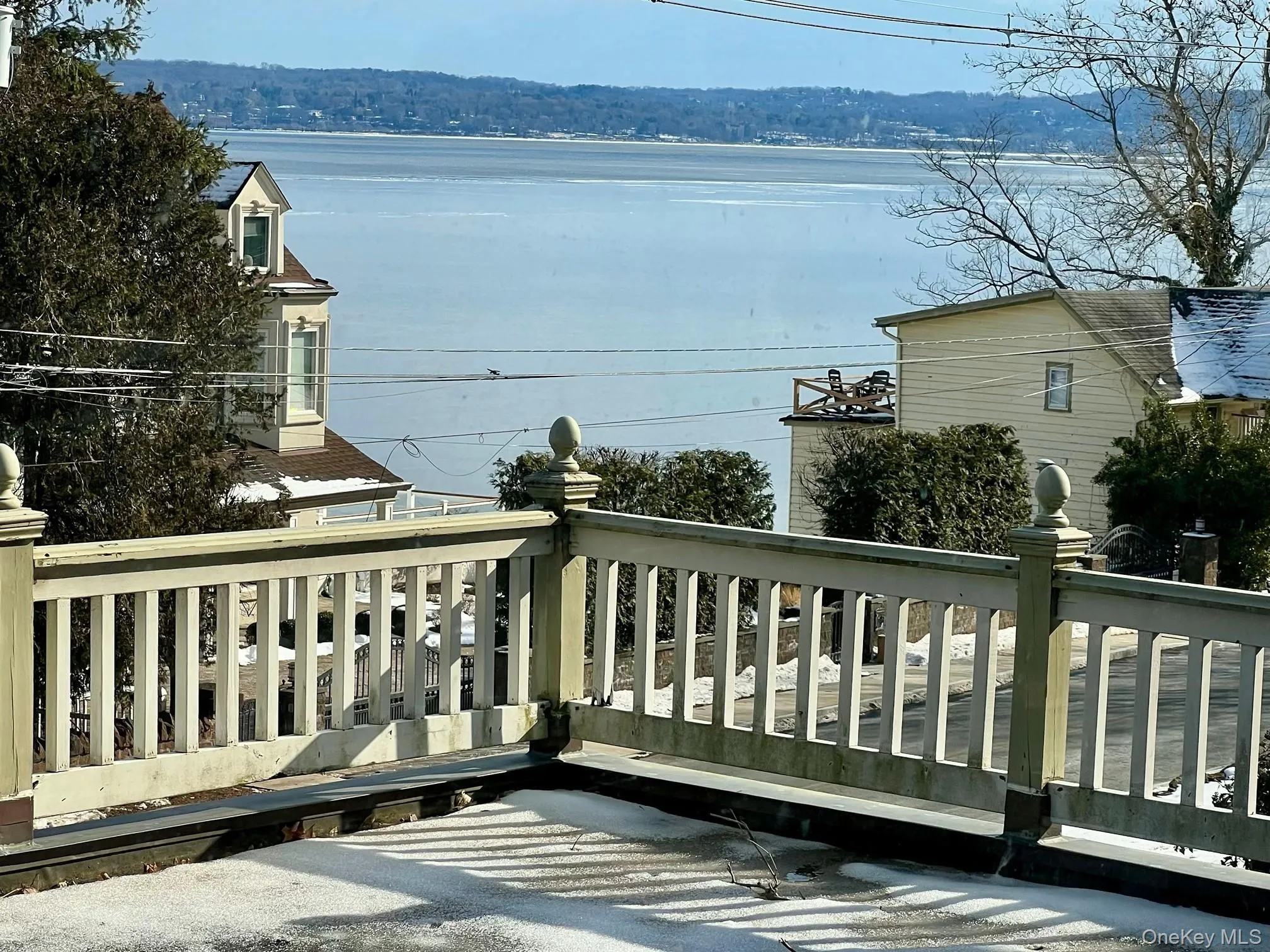 Deck featuring a water view Deck featuring a water view