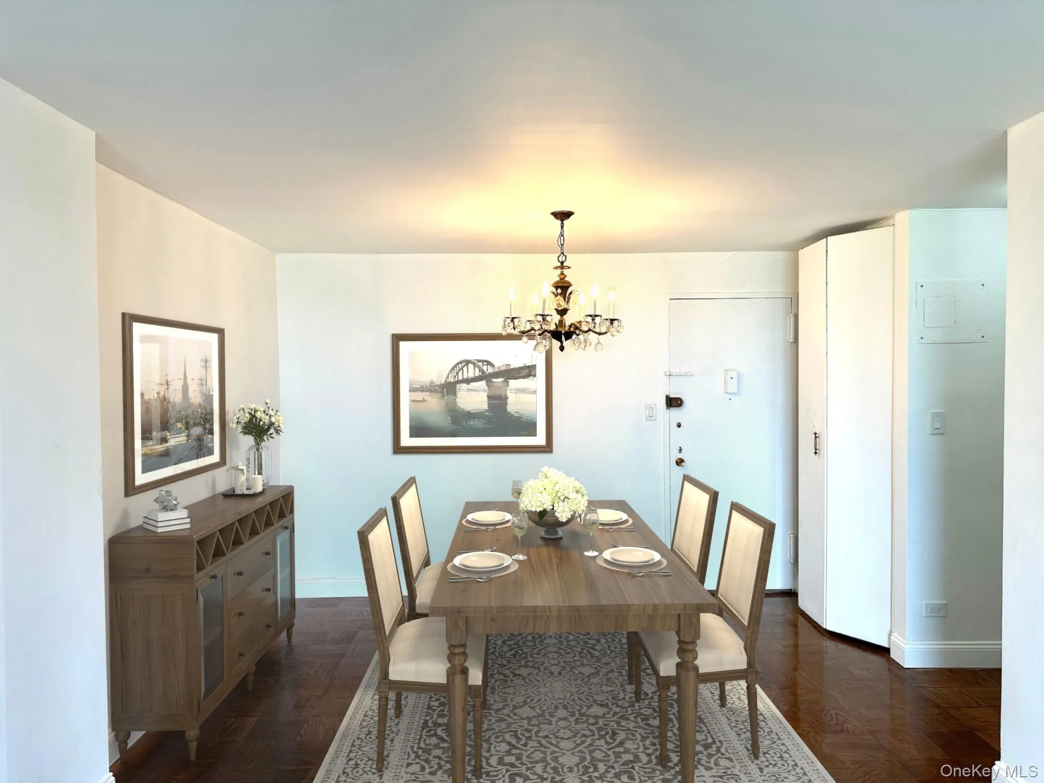 Dining space with a chandelier and baseboards Dining space with a chandelier and baseboards