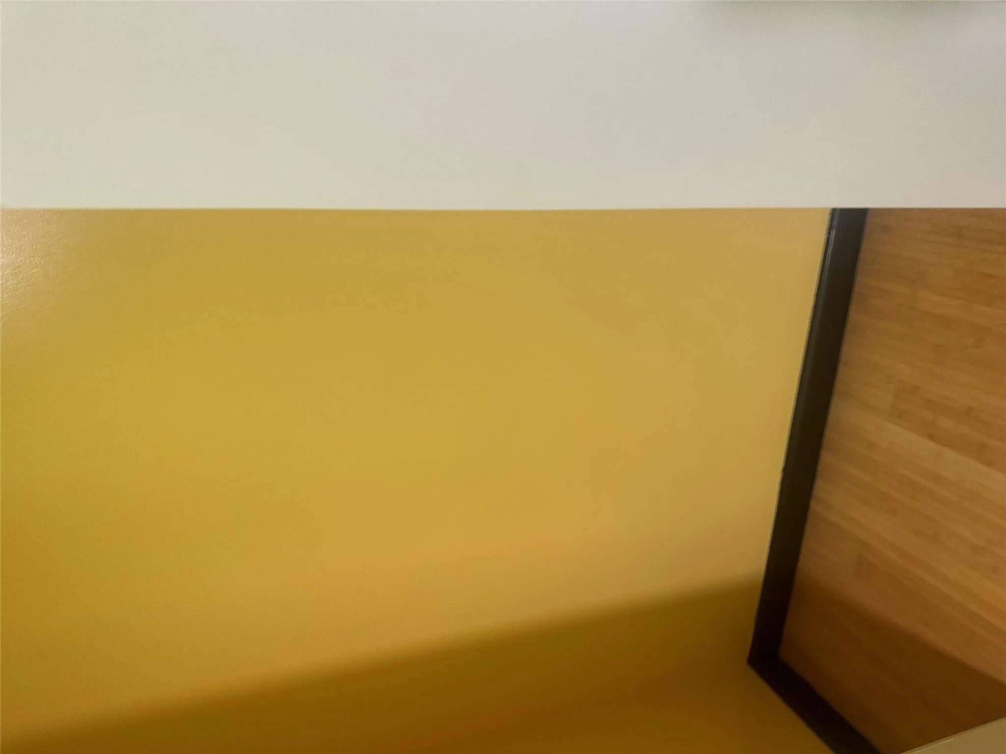 Unfurnished room with baseboards and light wood-style floors Unfurnished room with baseboards and light wood-style floors