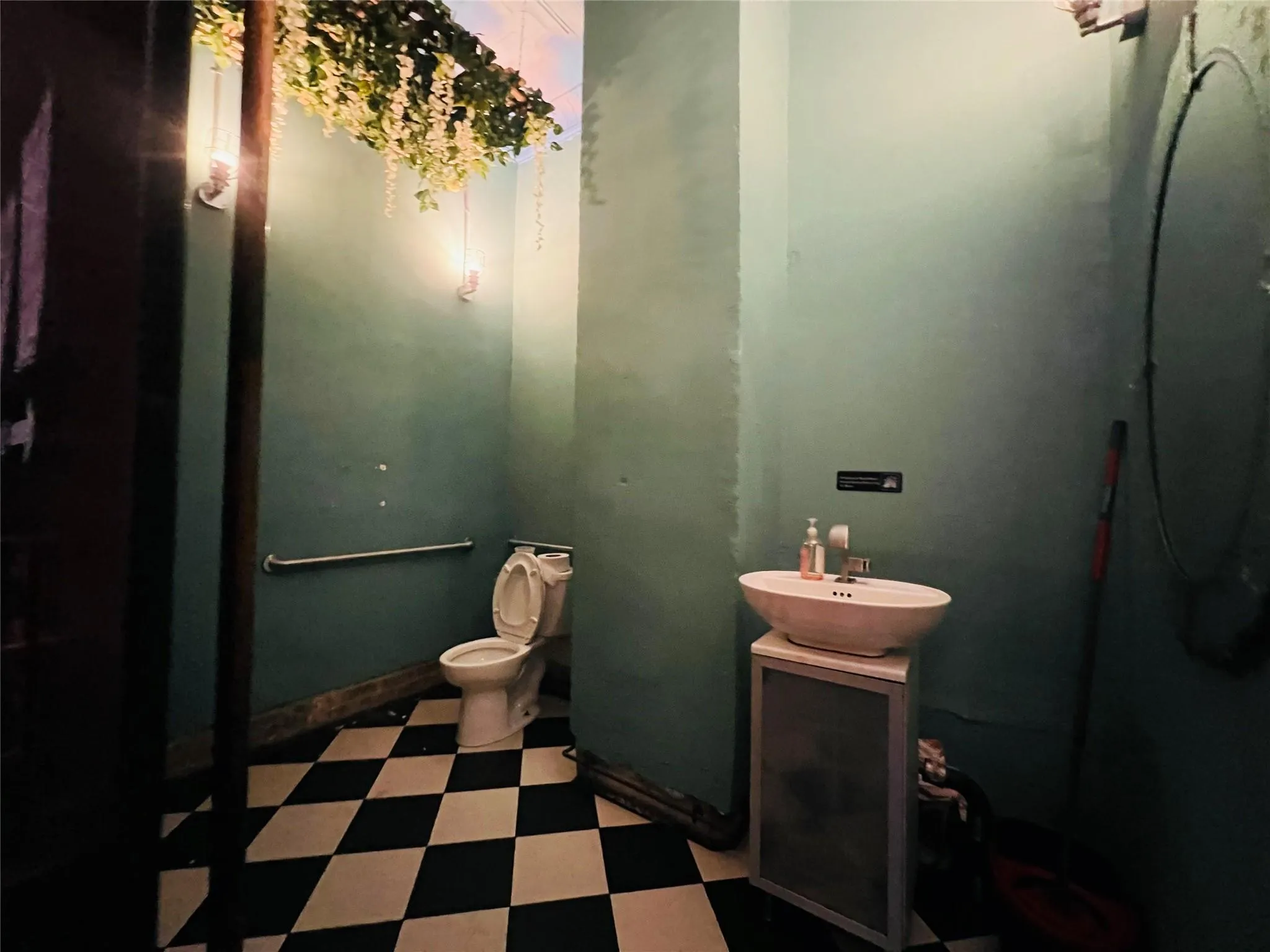 Bathroom featuring tile patterned floors and vanity Bathroom featuring tile patterned floors and vanity