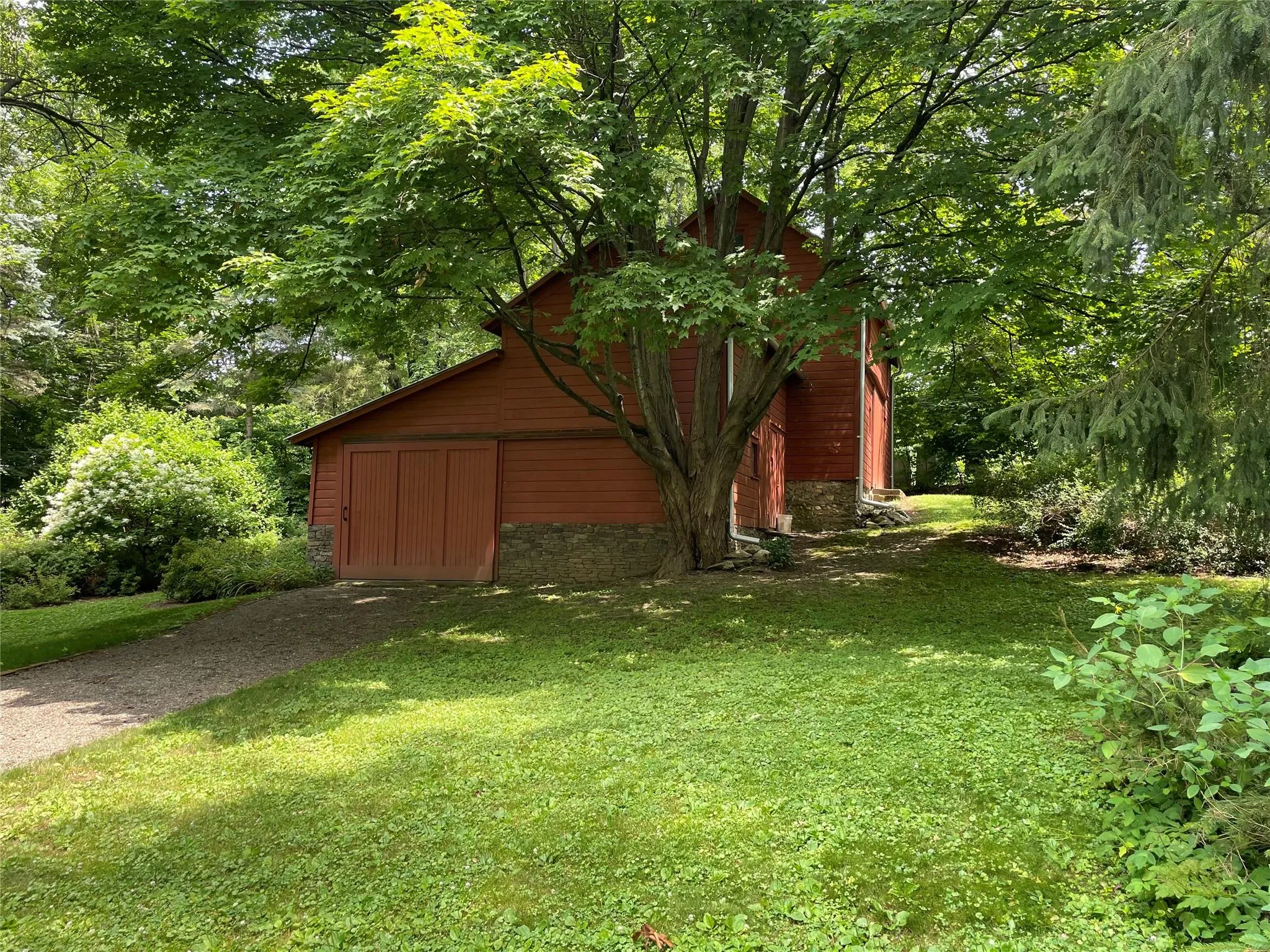 View of grassy yard with a barn and an outdoor structure View of grassy yard with a barn and an outdoor structure