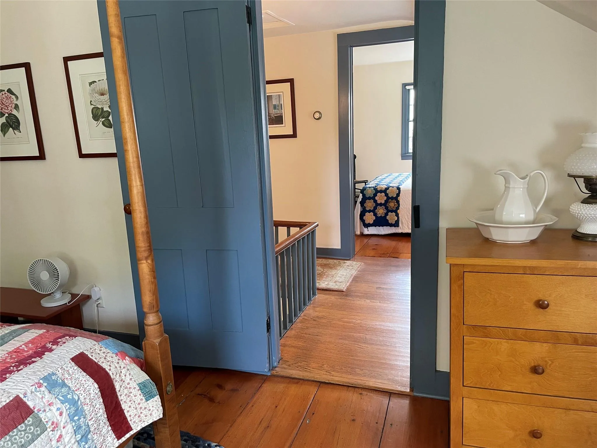 Bedroom featuring light wood-style flooring Bedroom featuring light wood-style flooring