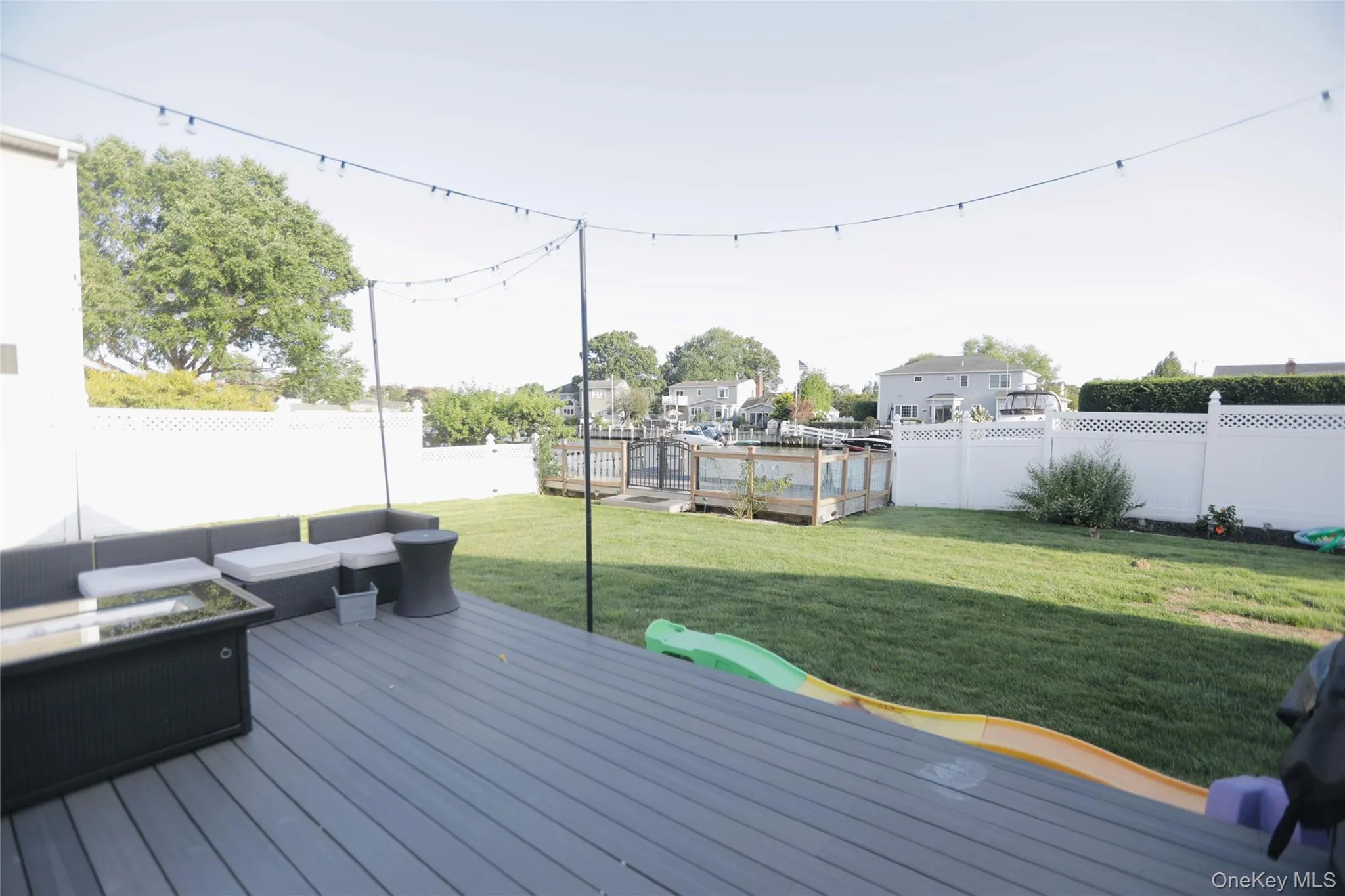 Deck featuring a fenced backyard and outdoor lounge area Deck featuring a fenced backyard and outdoor lounge area