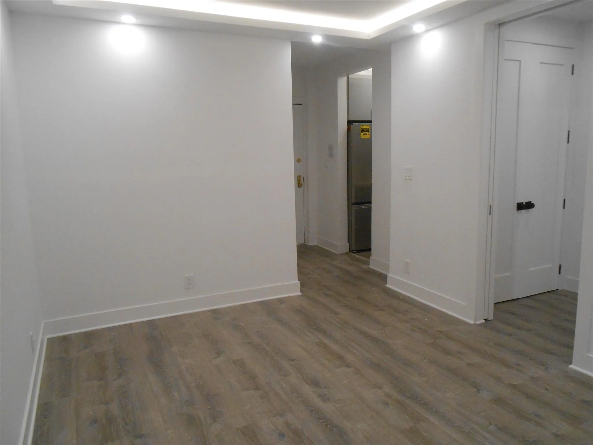Empty room featuring wood finished floors Empty room featuring wood finished floors