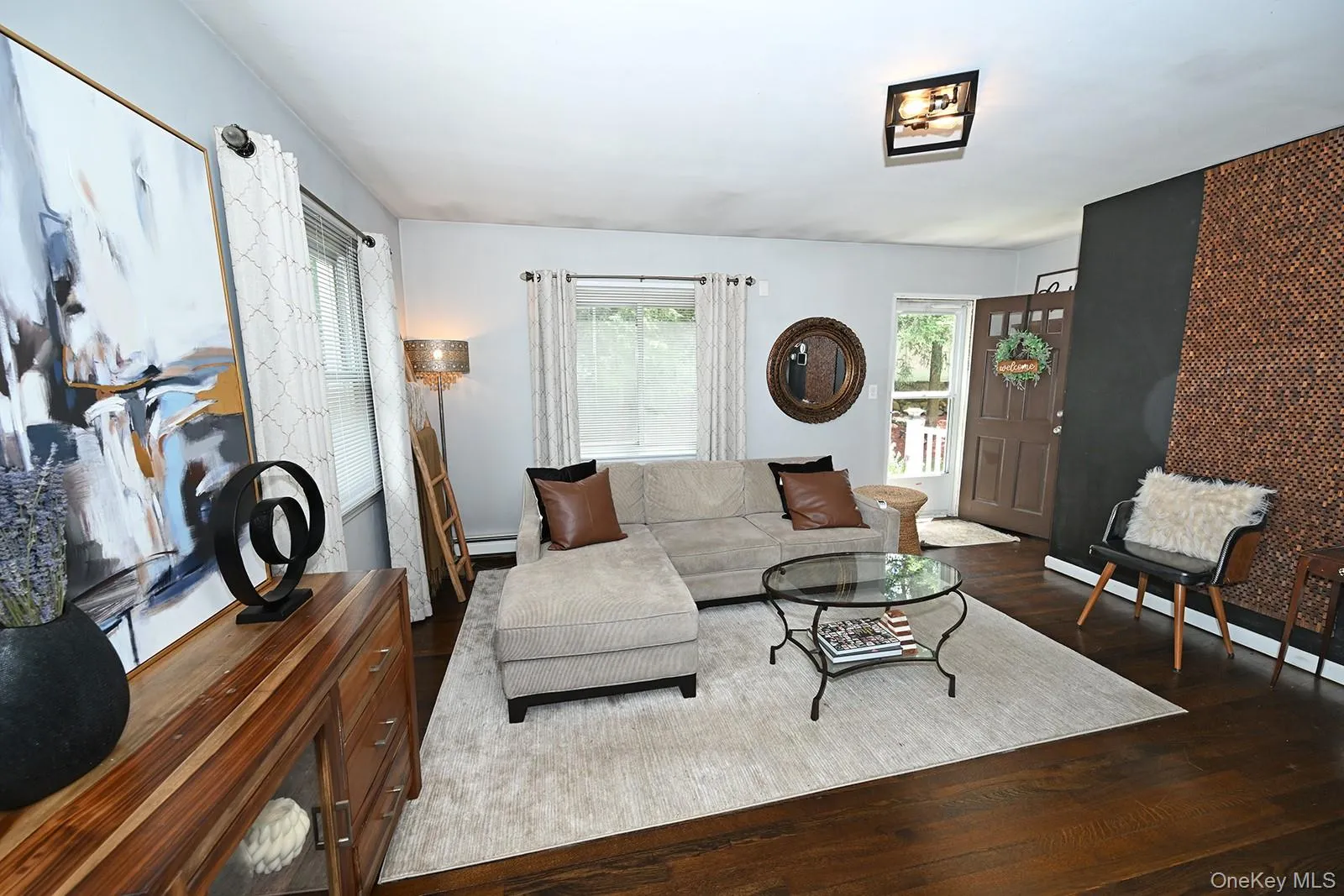 Living area featuring wood finished floors Living area featuring wood finished floors