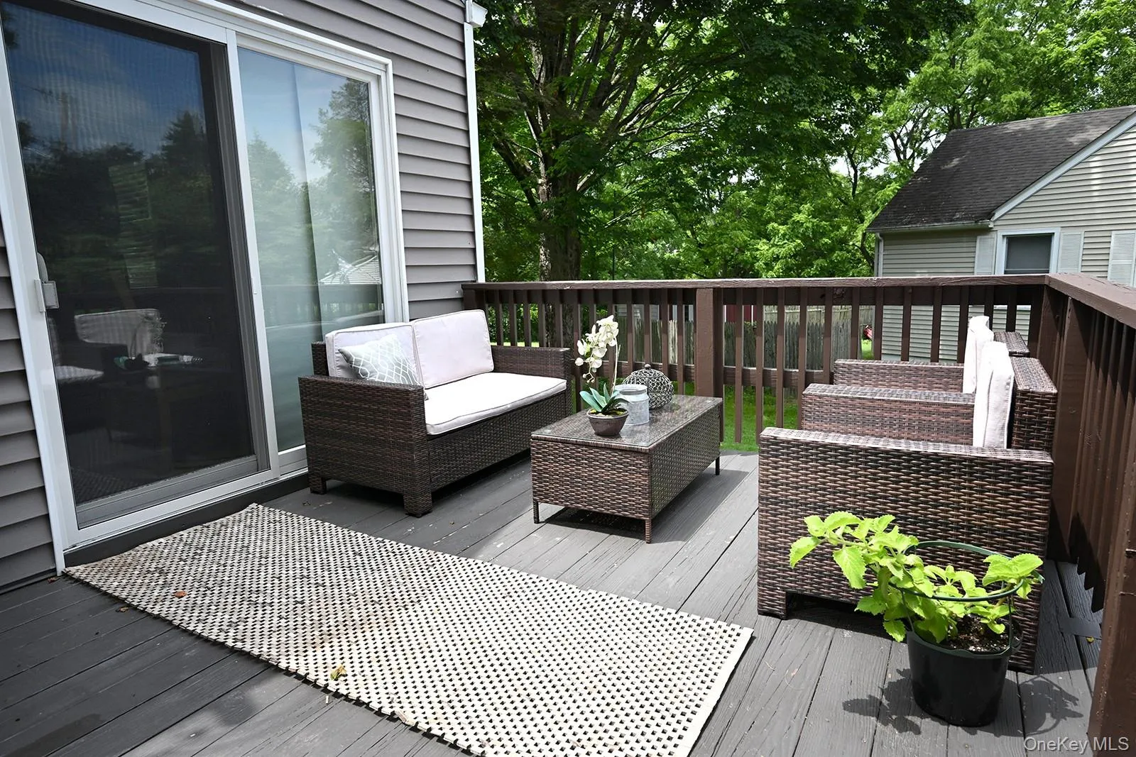 Wooden terrace with an outdoor hangout area Wooden terrace with an outdoor hangout area