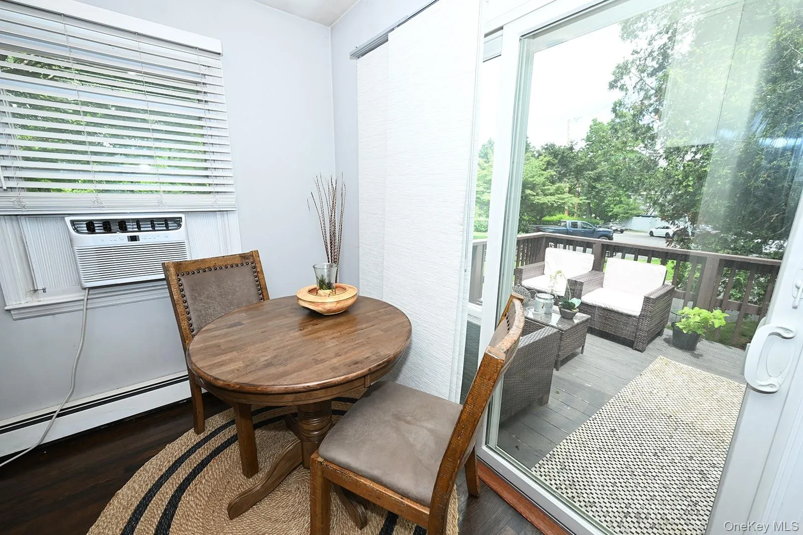 Sunroom featuring plenty of natural light Sunroom featuring plenty of natural light