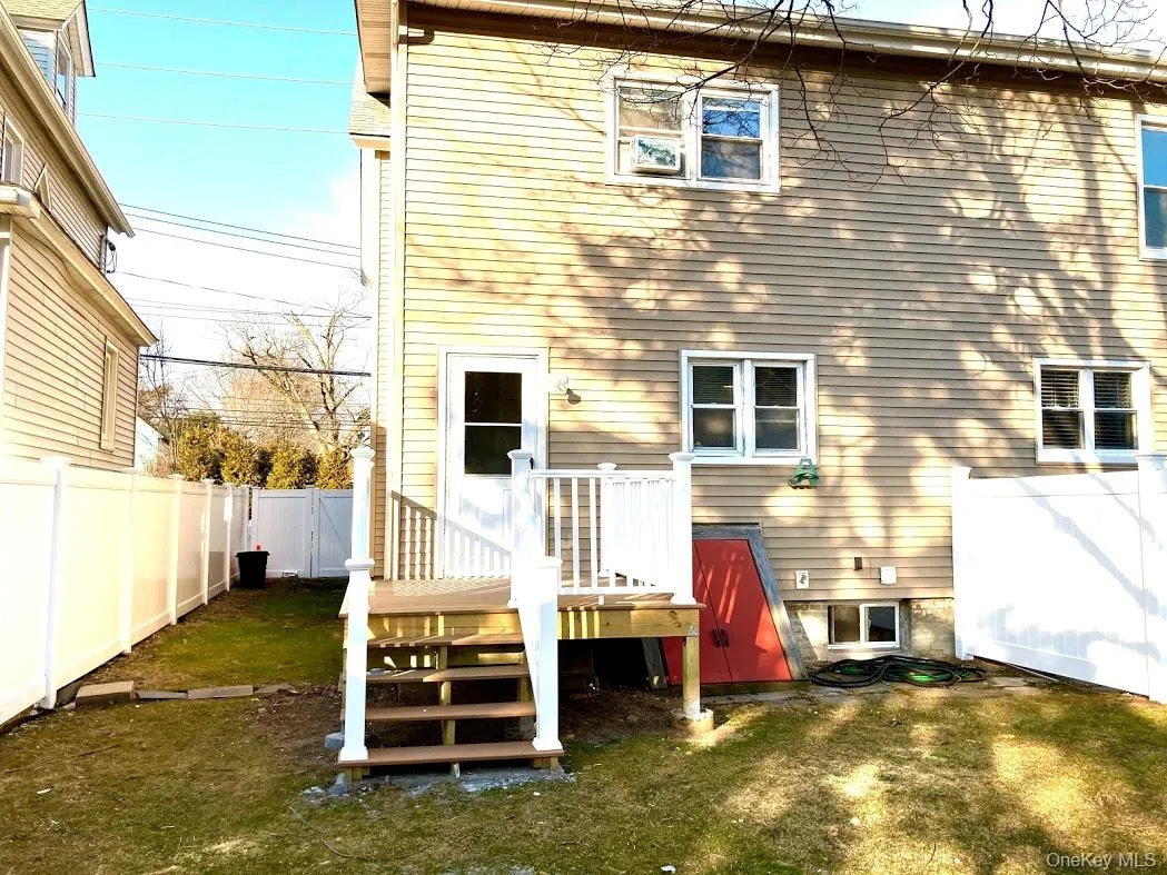 Back of house featuring a fenced backyard Back of house featuring a fenced backyard