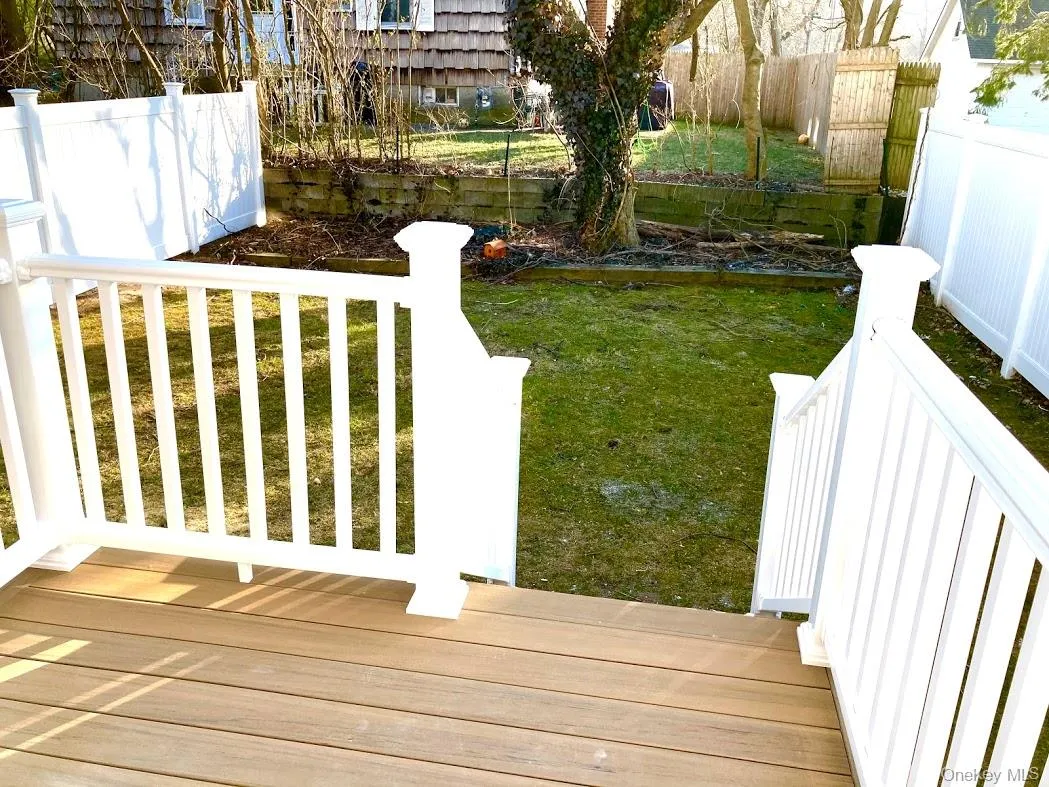 View of yard featuring a wooden deck View of yard featuring a wooden deck