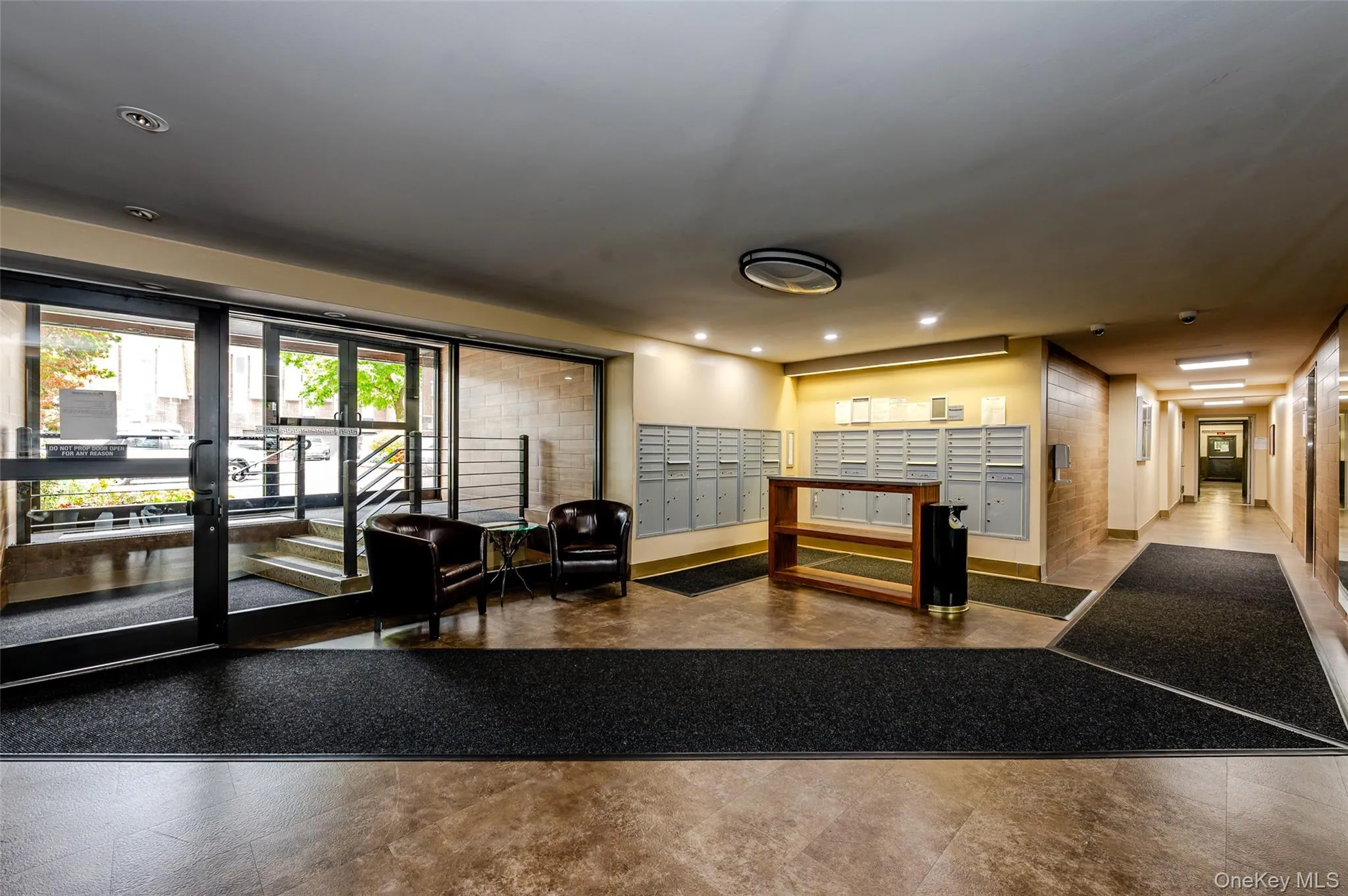 Building lobby featuring recessed lighting Building lobby featuring recessed lighting