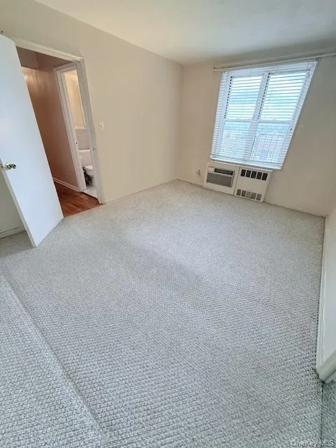 Spacious bedroom with large window and closet. Double closet and plenty of natural light. Overlooks the front of the building and it's beautiful landscaping. Spacious bedroom with large window and closet. Double closet and plenty of natural light. Overlooks the front of the building and it's beautiful landscaping.