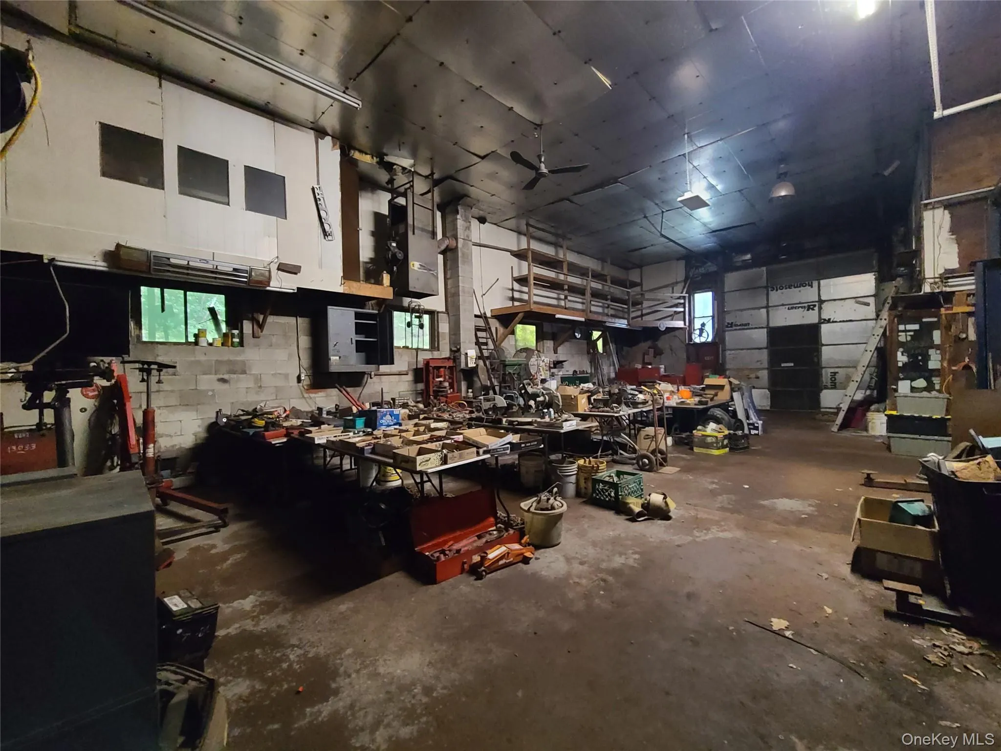 Garage with a workshop area Garage with a workshop area