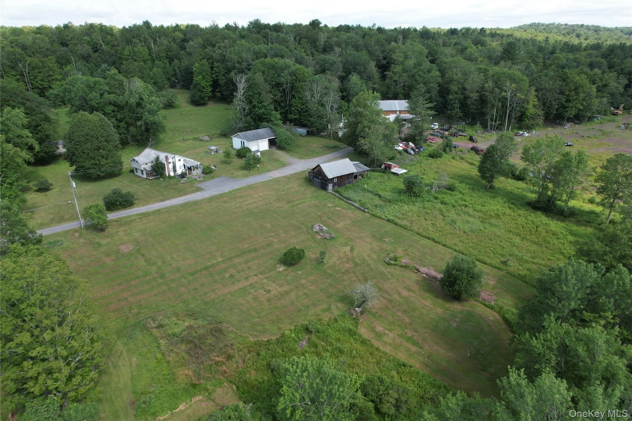 Aerial view of property and surrounding area with rural landscape Aerial view of property and surrounding area with rural landscape