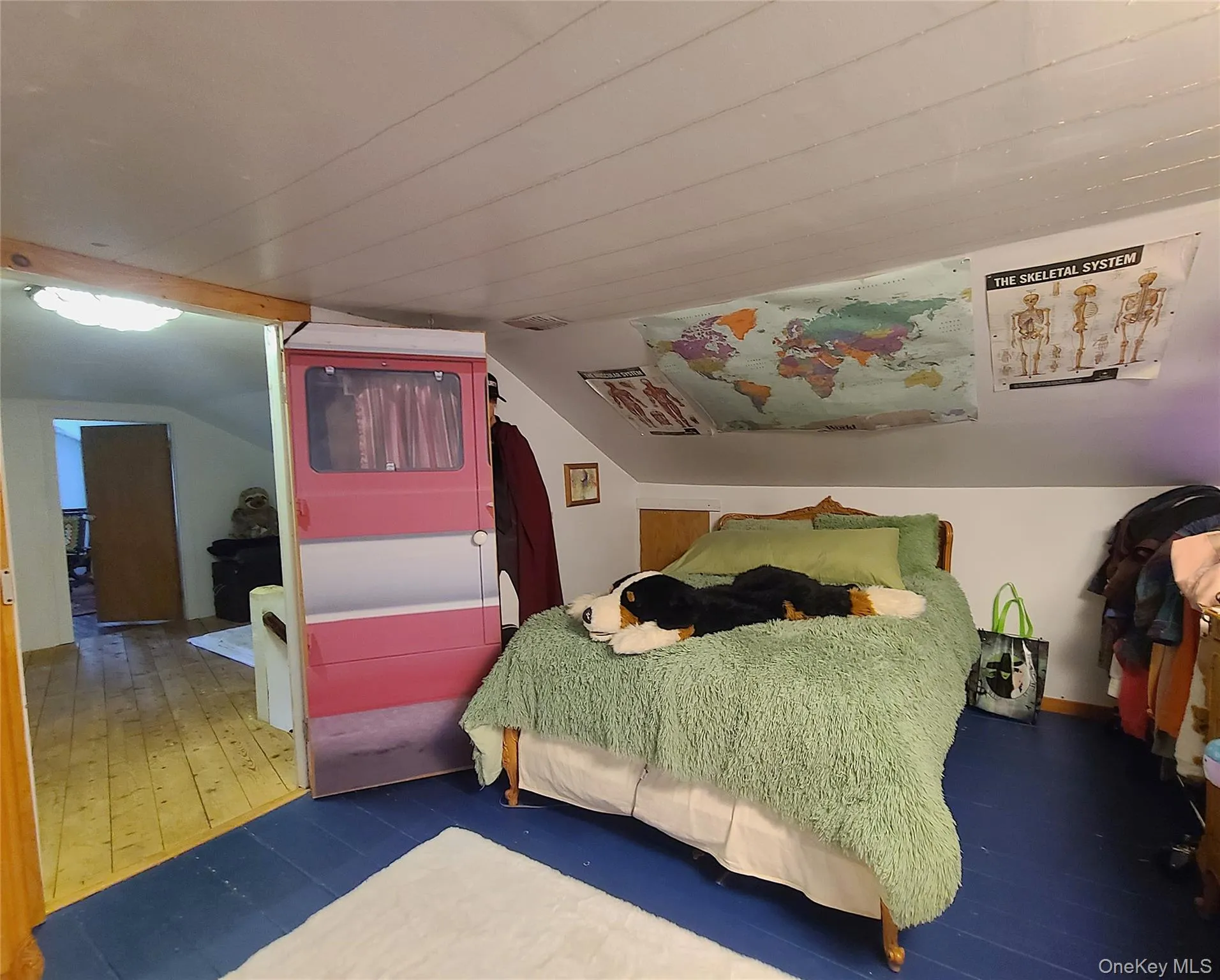 Bedroom with lofted ceiling Bedroom with lofted ceiling