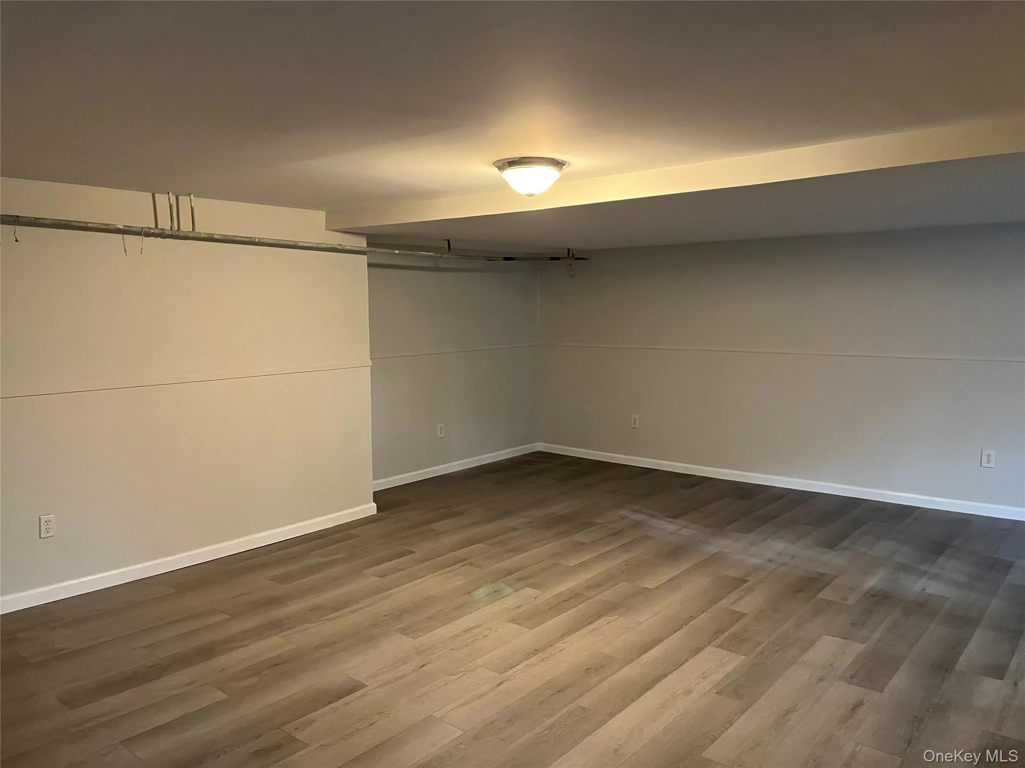 Finished basement with vinyl planked floors Finished basement with vinyl planked floors
