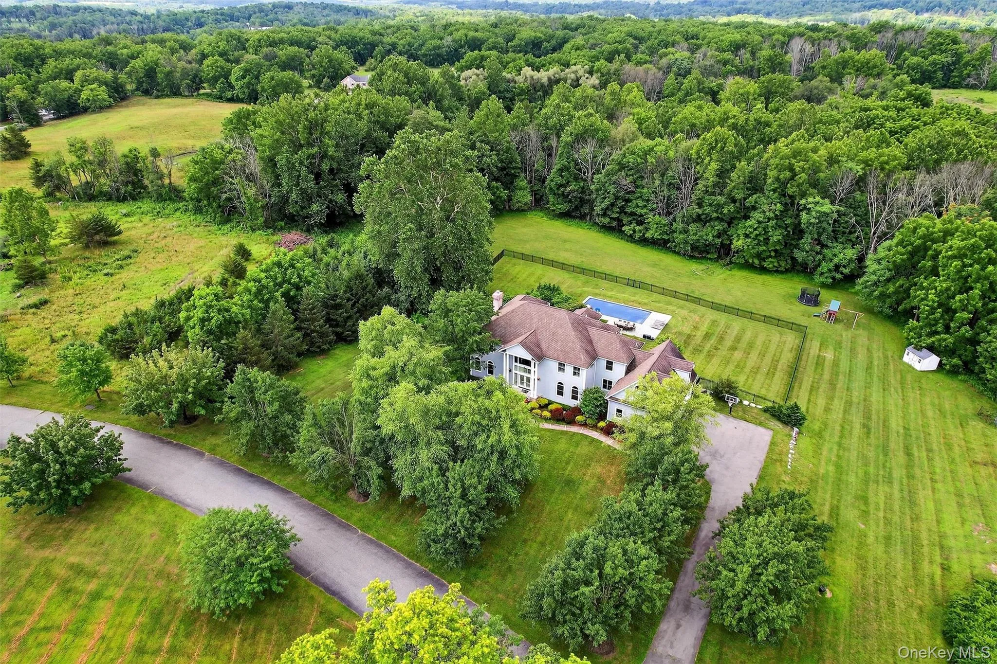 View of subject property featuring a forest View of subject property featuring a forest