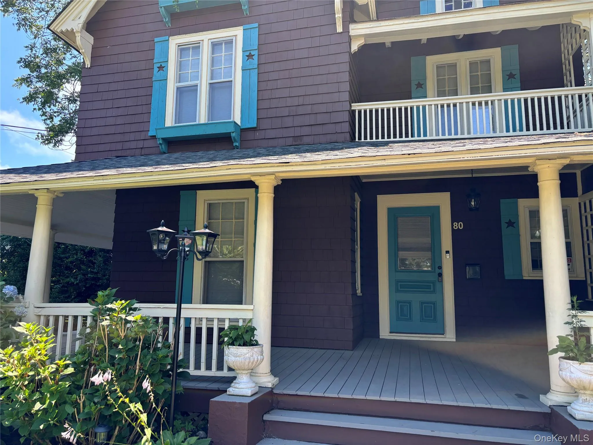 Wrap around porch newly painted, Balcony facing East Wrap around porch newly painted, Balcony facing East