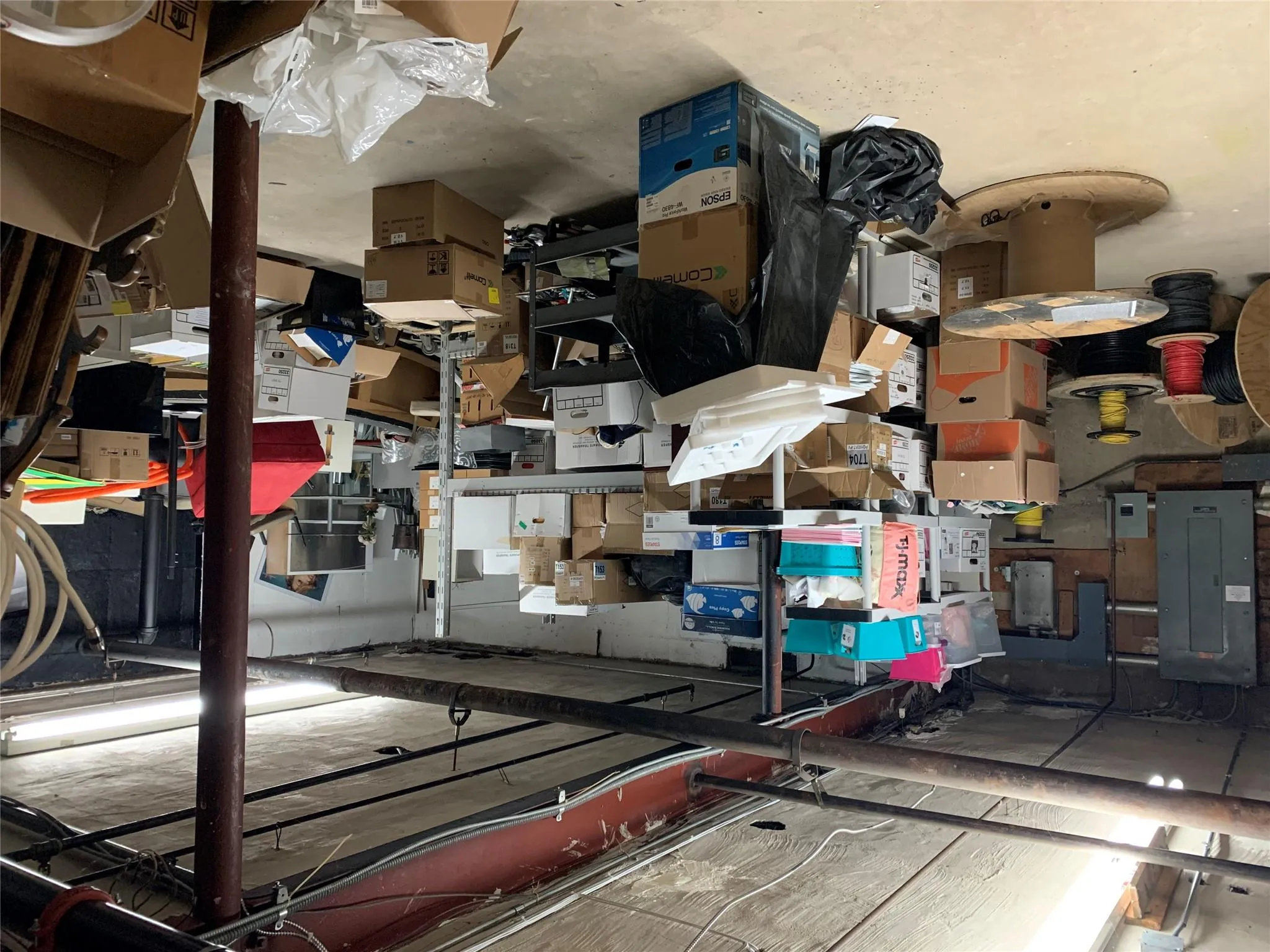 Unfinished basement with electric panel Unfinished basement with electric panel