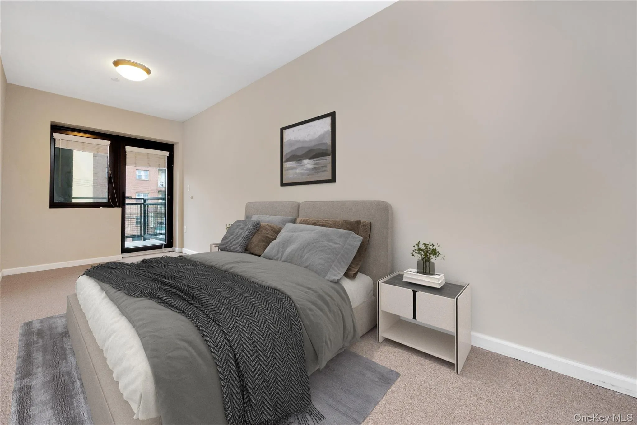 Bedroom with carpet floors and baseboards Bedroom with carpet floors and baseboards