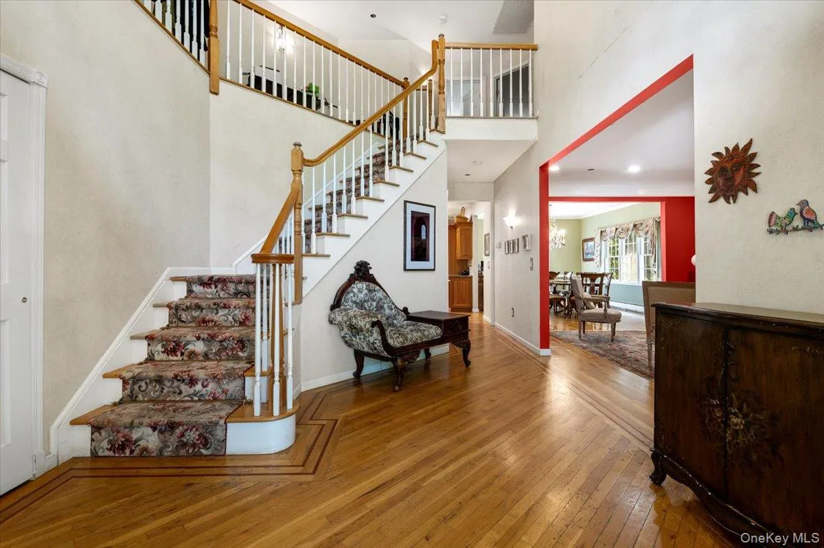 Entry Foyer With High Ceiling, French Doors and H/W Floors Entry Foyer With High Ceiling, French Doors and H/W Floors