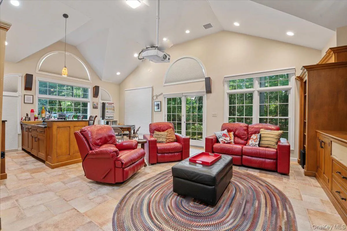 Vaulted Ceiling, Abundance of natural light, Projection Screen, Built in Bar Vaulted Ceiling, Abundance of natural light, Projection Screen, Built in Bar