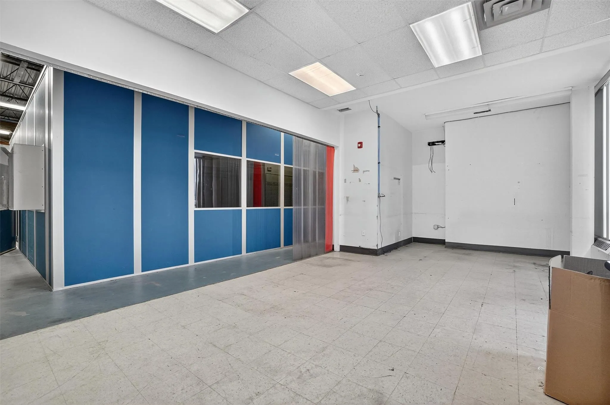 Empty room featuring tile patterned floors Empty room featuring tile patterned floors