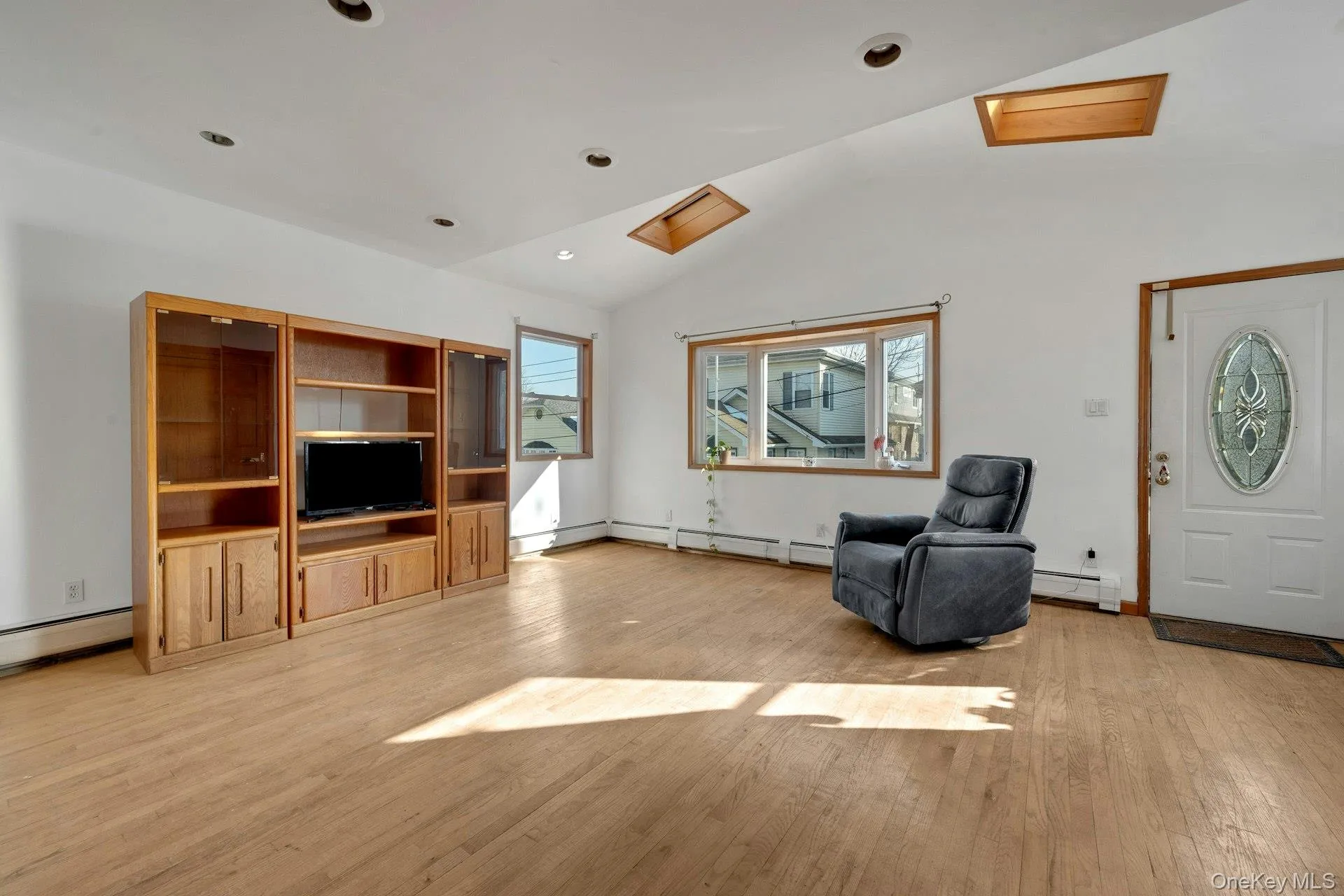 Entrance Nice size living room with 2 skylights Entrance Nice size living room with 2 skylights