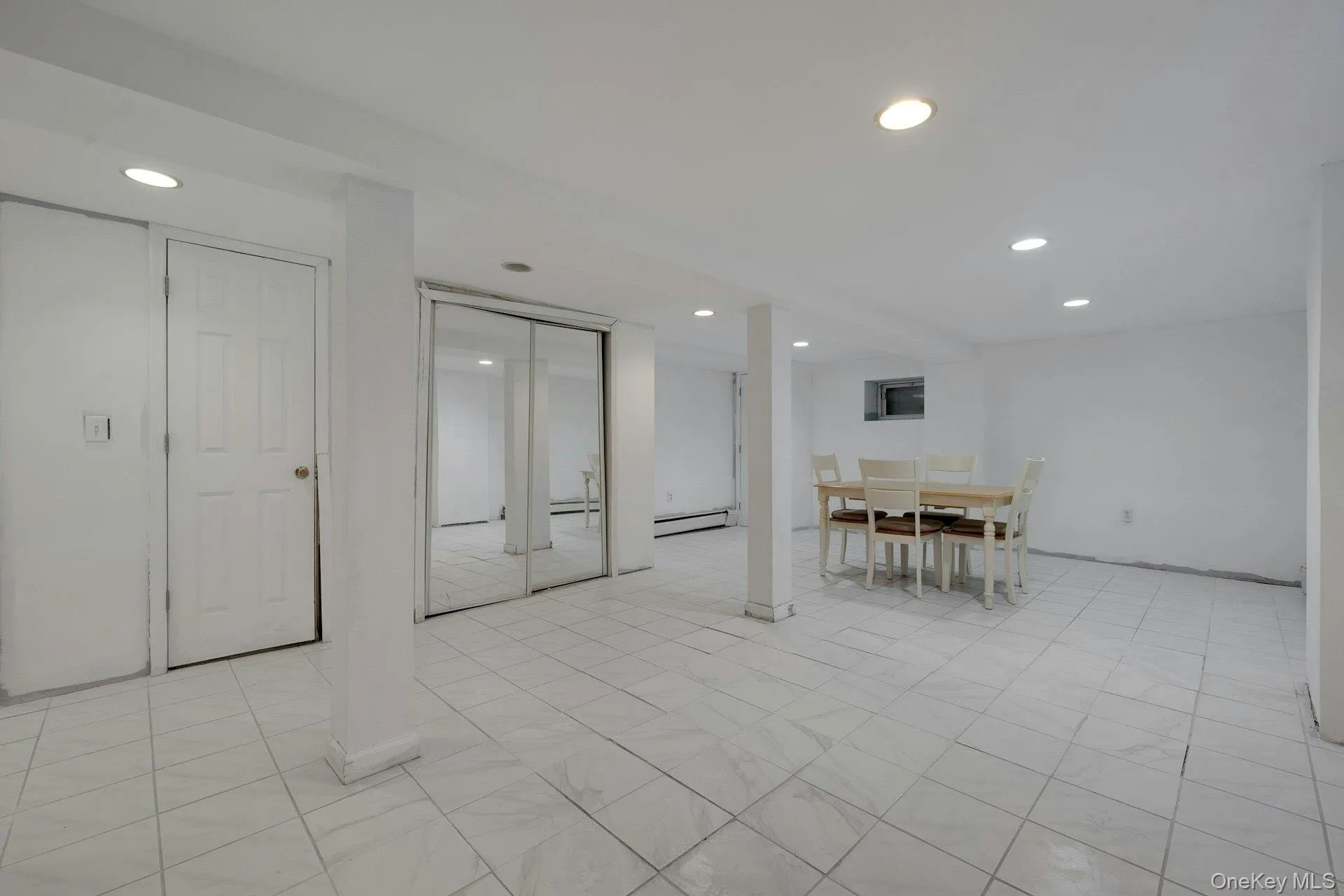 Basement recreation room with plenty of closets Basement recreation room with plenty of closets