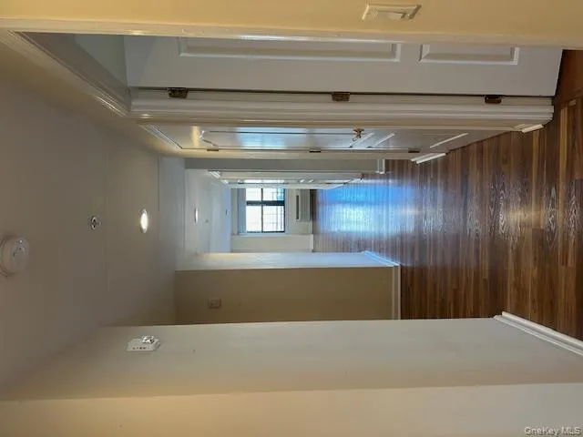 Hall featuring dark wood-style flooring and recessed lighting Hall featuring dark wood-style flooring and recessed lighting