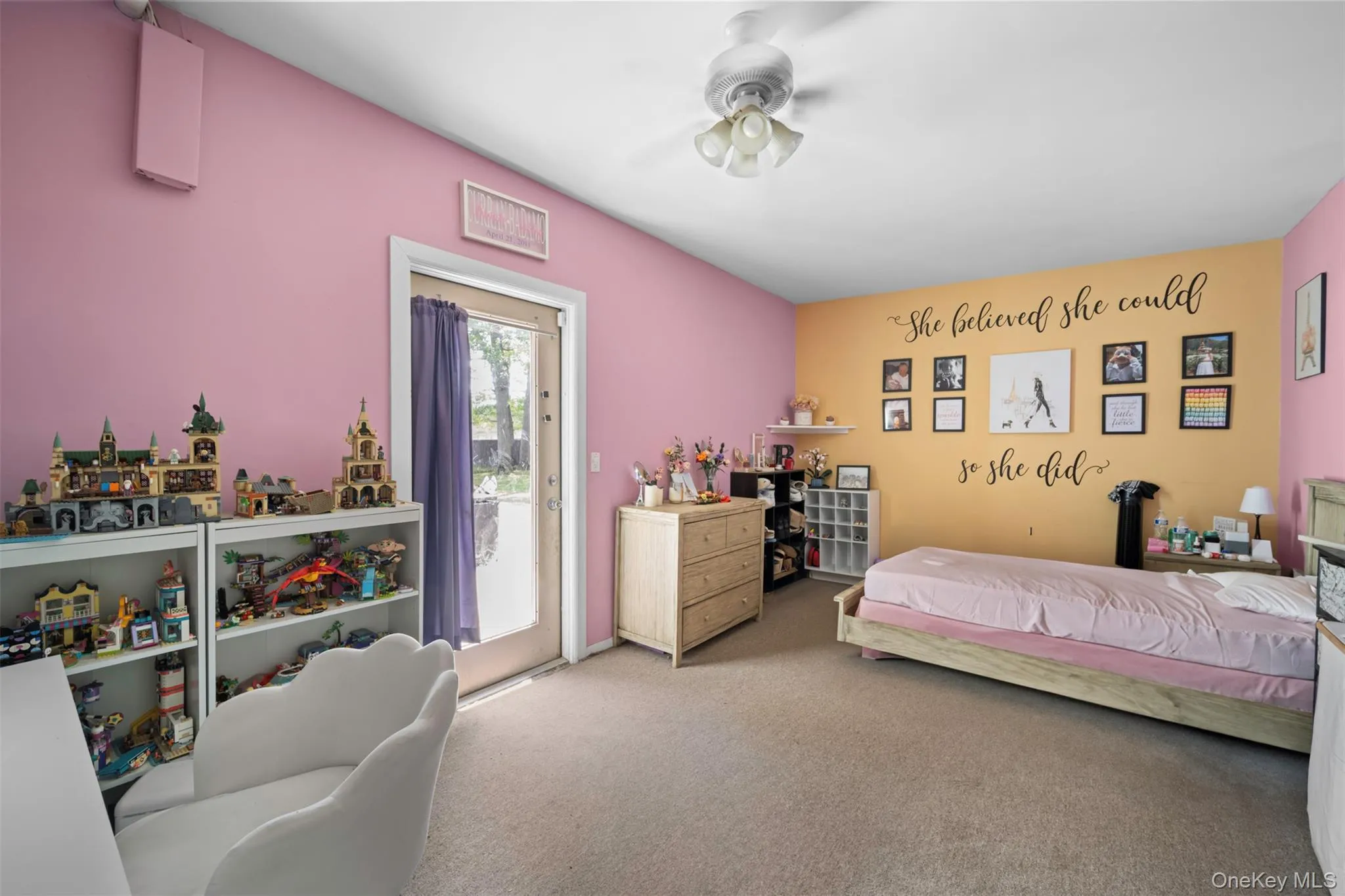 Carpeted bedroom featuring access to outside Carpeted bedroom featuring access to outside