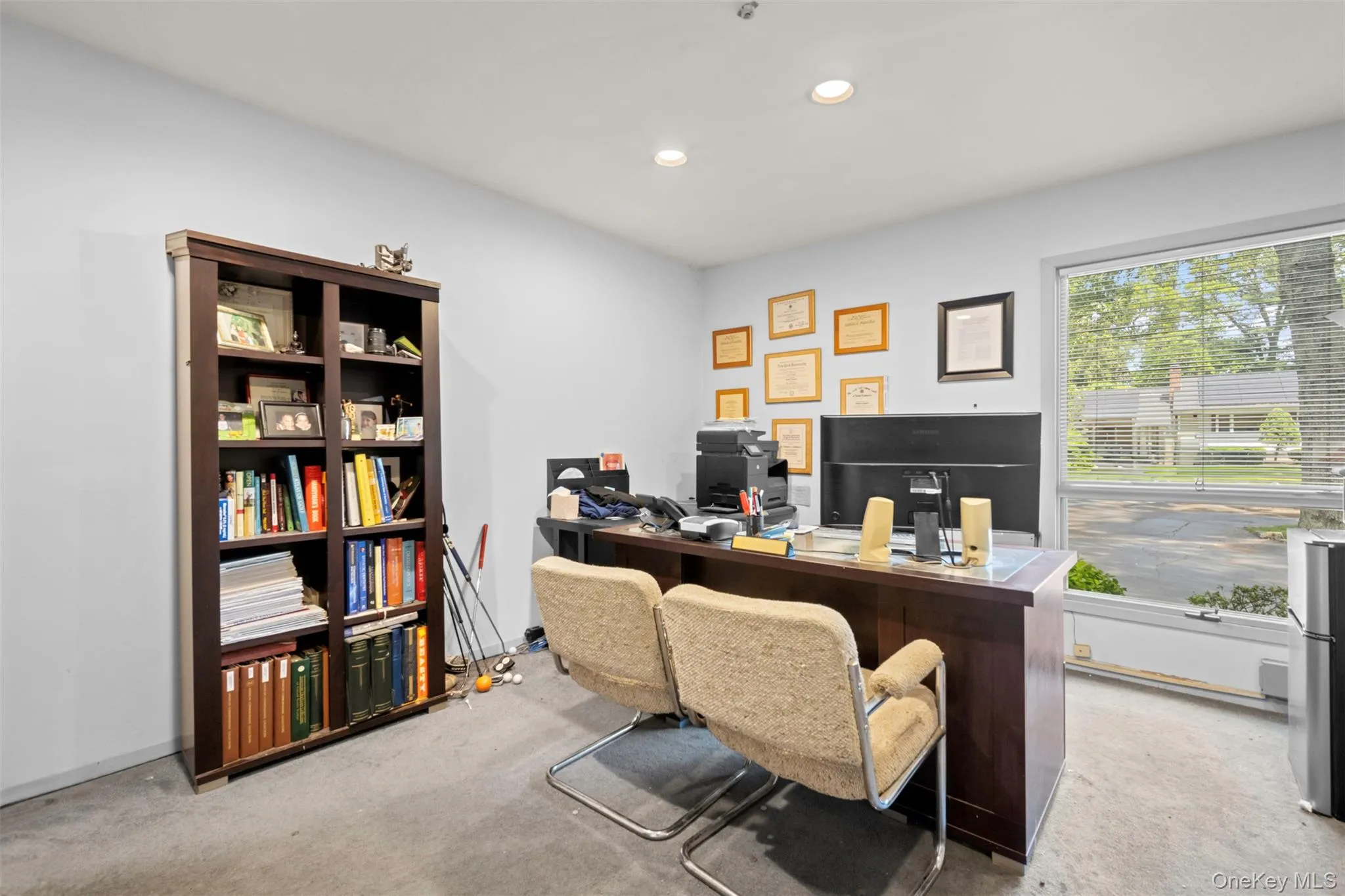 Carpeted home office with recessed lighting Carpeted home office with recessed lighting