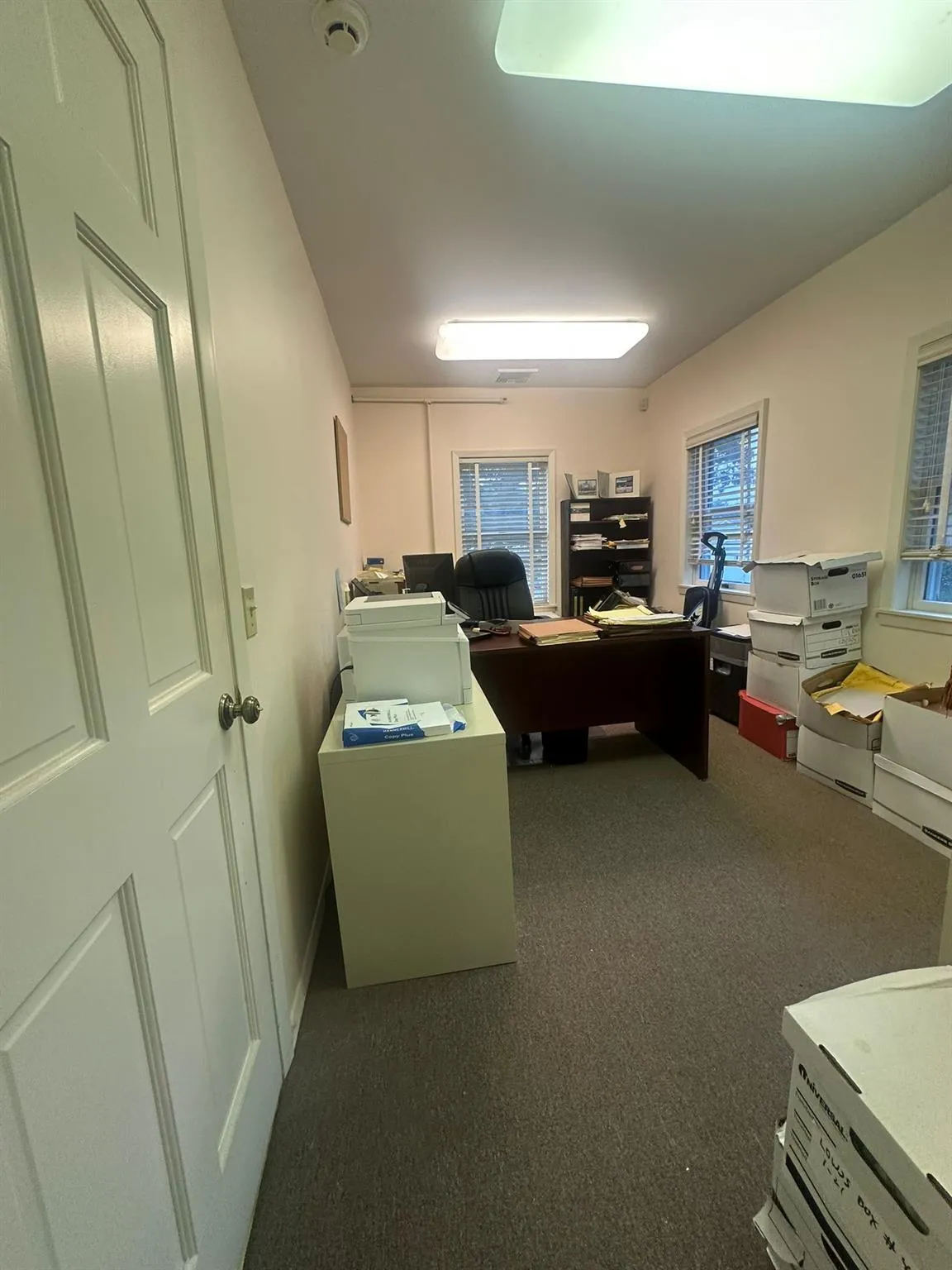 Office featuring dark carpet Office featuring dark carpet