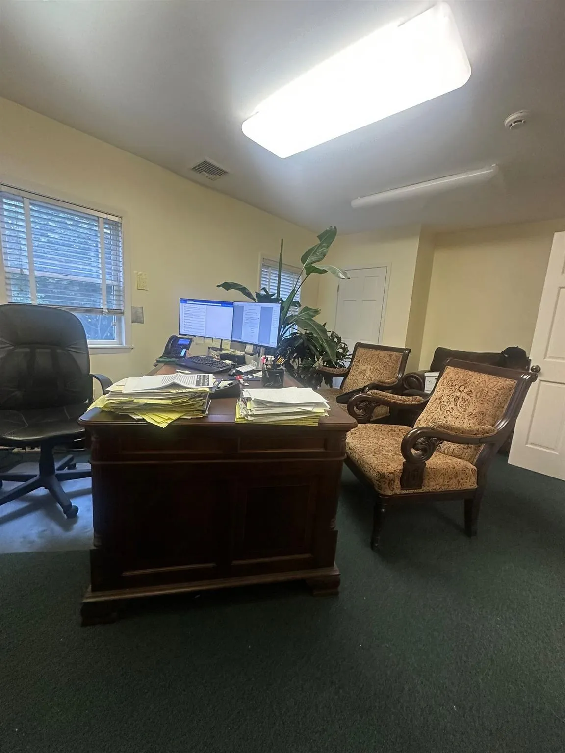 Office with dark carpet Office with dark carpet