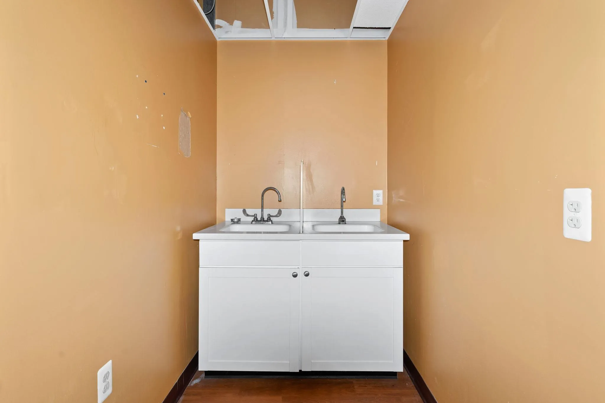 Laundry area featuring a sink Laundry area featuring a sink