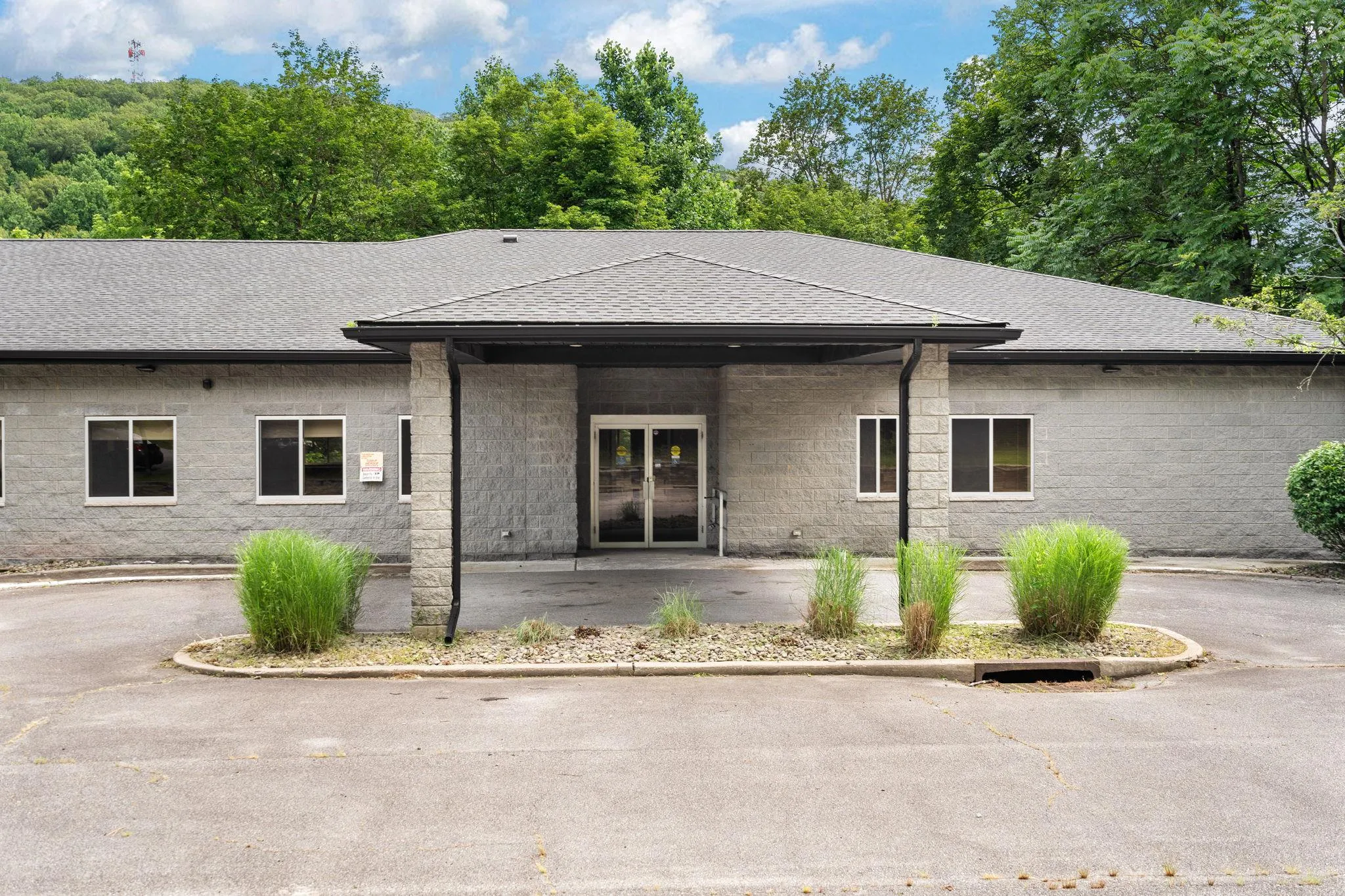 View of front of property with a shingled roof View of front of property with a shingled roof