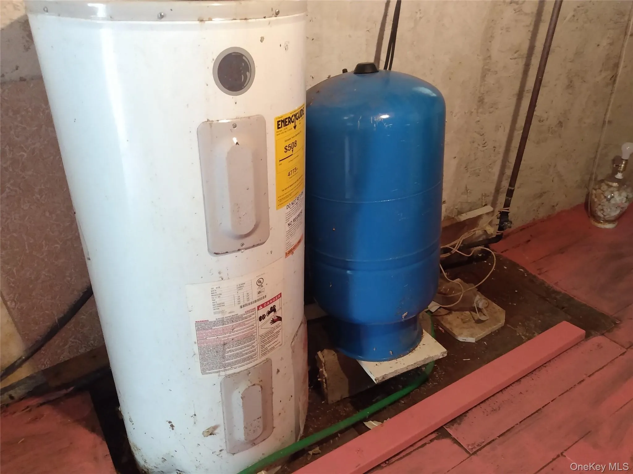 Utilities featuring electric water heater Utilities featuring electric water heater