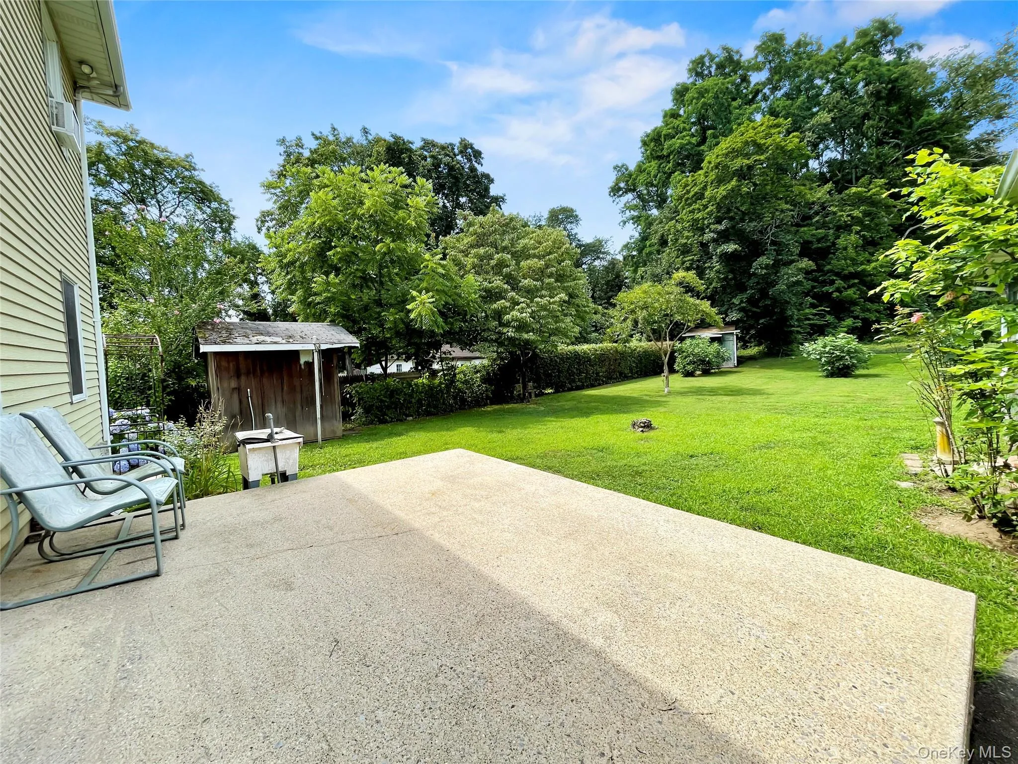 View of patio / terrace with a storage shed View of patio / terrace with a storage shed
